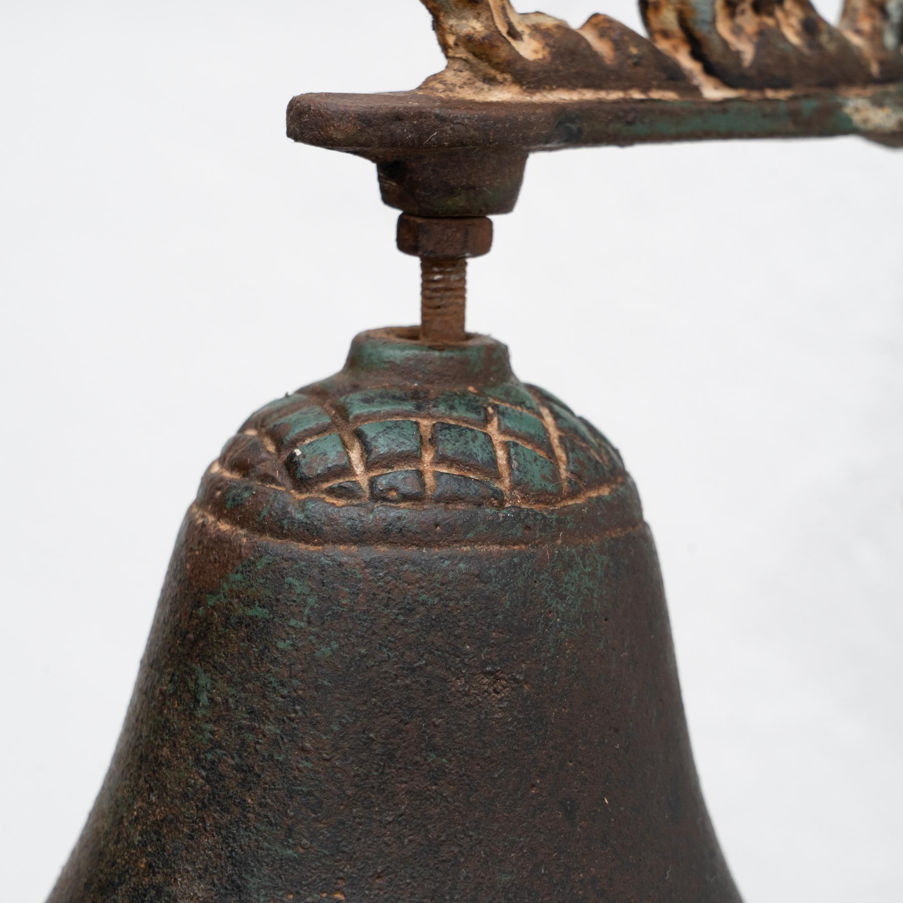 Early 20th Century Antique Rustic Spanish Wall Cast Iron Decorative Bell For Sale 4