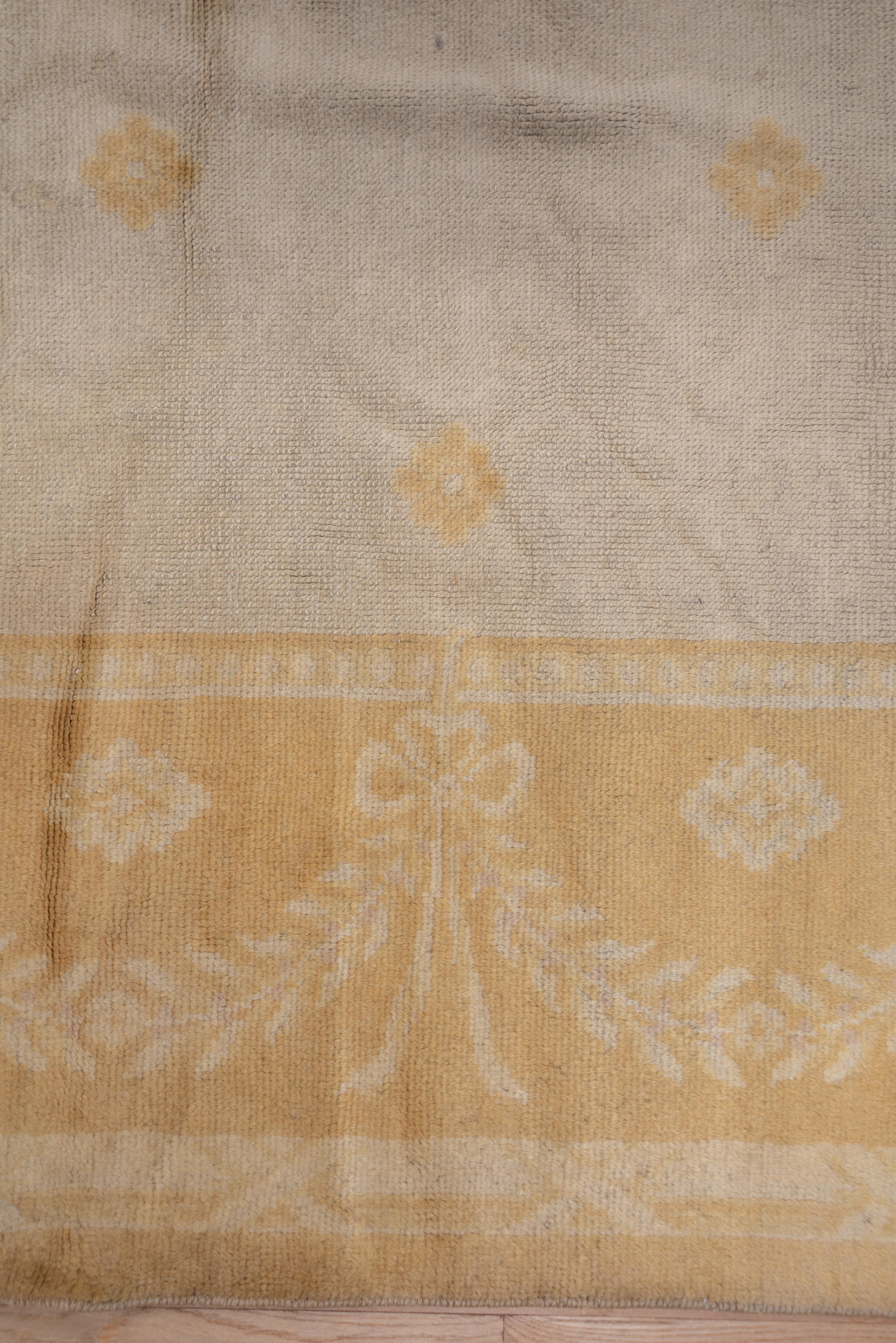 This French high-pile carpet is a study in cream and softest gold with an open field.