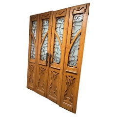 Early 20th Century Used Set of Four Doors Wood with Iron Panels.