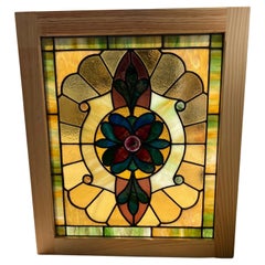 Early 20th Century Antique Stained Glass Window in a New Wood Frame 