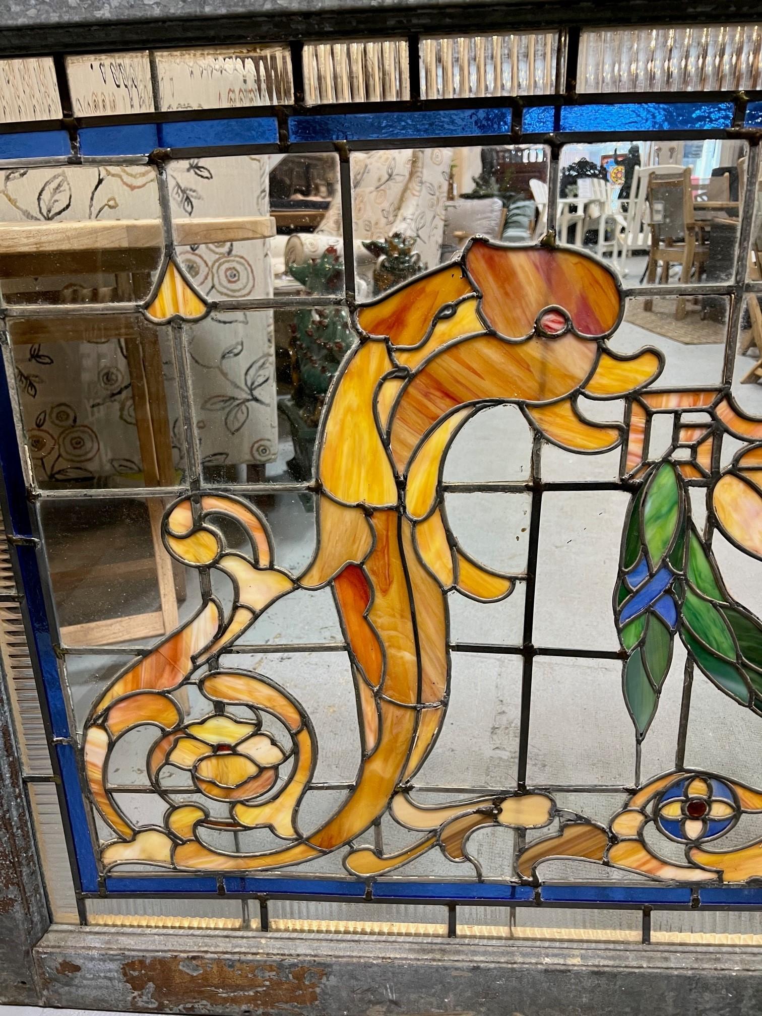 Galvanized Early 20th Century Antique Stained Glass Window with Dolphins and Urn For Sale