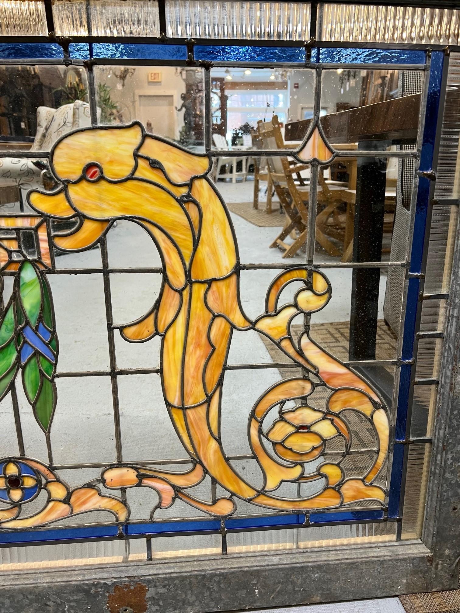 Early 20th Century Antique Stained Glass Window with Dolphins and Urn In Good Condition For Sale In Stamford, CT