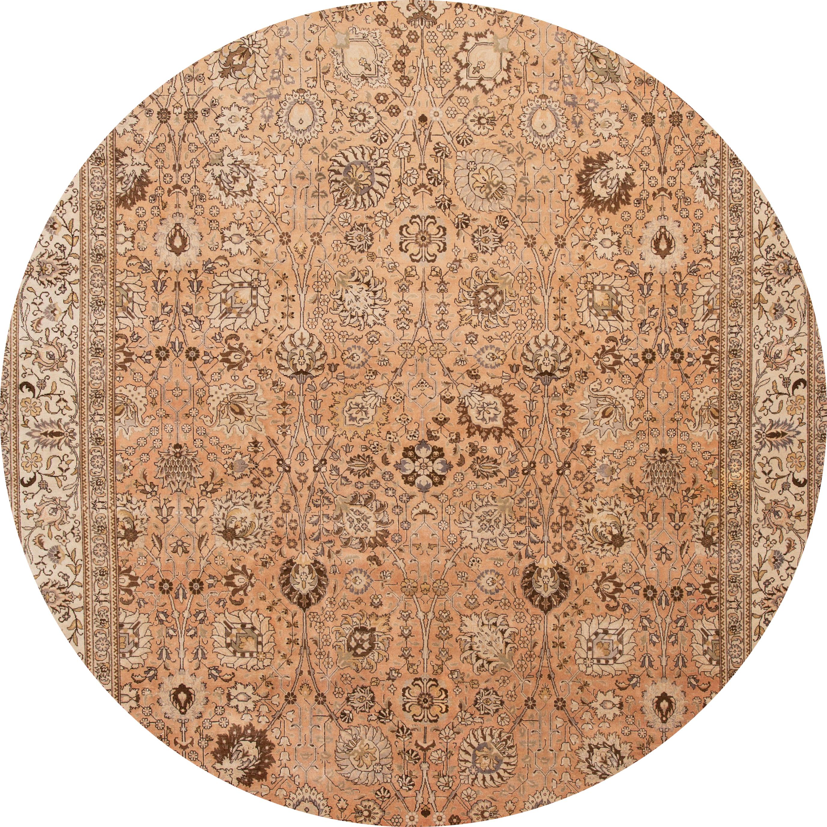 Early 20th century antique Tabriz wool rug with a floral motif. This piece has great colors and a beautiful design. It would be the perfect addition to your home. Low pile. Made with 100% wool. Measures: 11' x 18'.