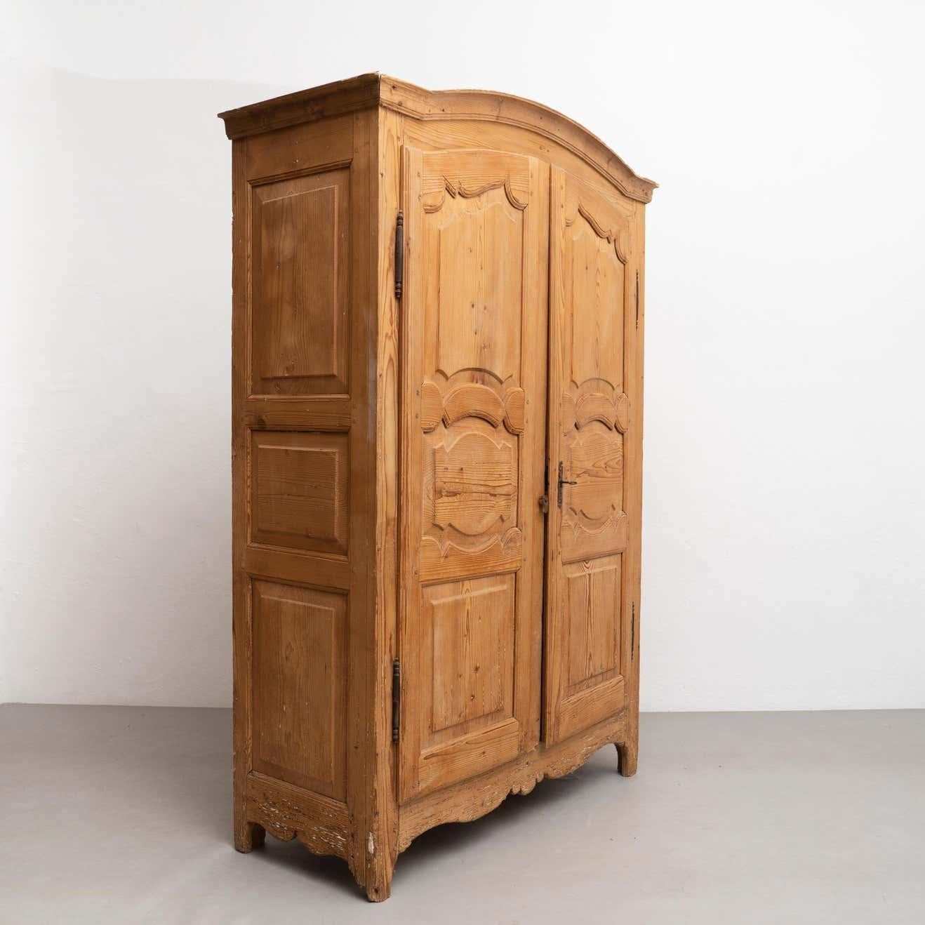 Traditional rustic pinewood dresser.    Made by unknown artisan from Spain, circa 1930.    In original condition, with minor wear consistent with age and use, preserving a beautiful patina.    Key lock is not working.    Material:  Wood.   