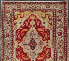 Tappeto antico turco Sivas dei primi del Novecento con medaglione centrale in rosso