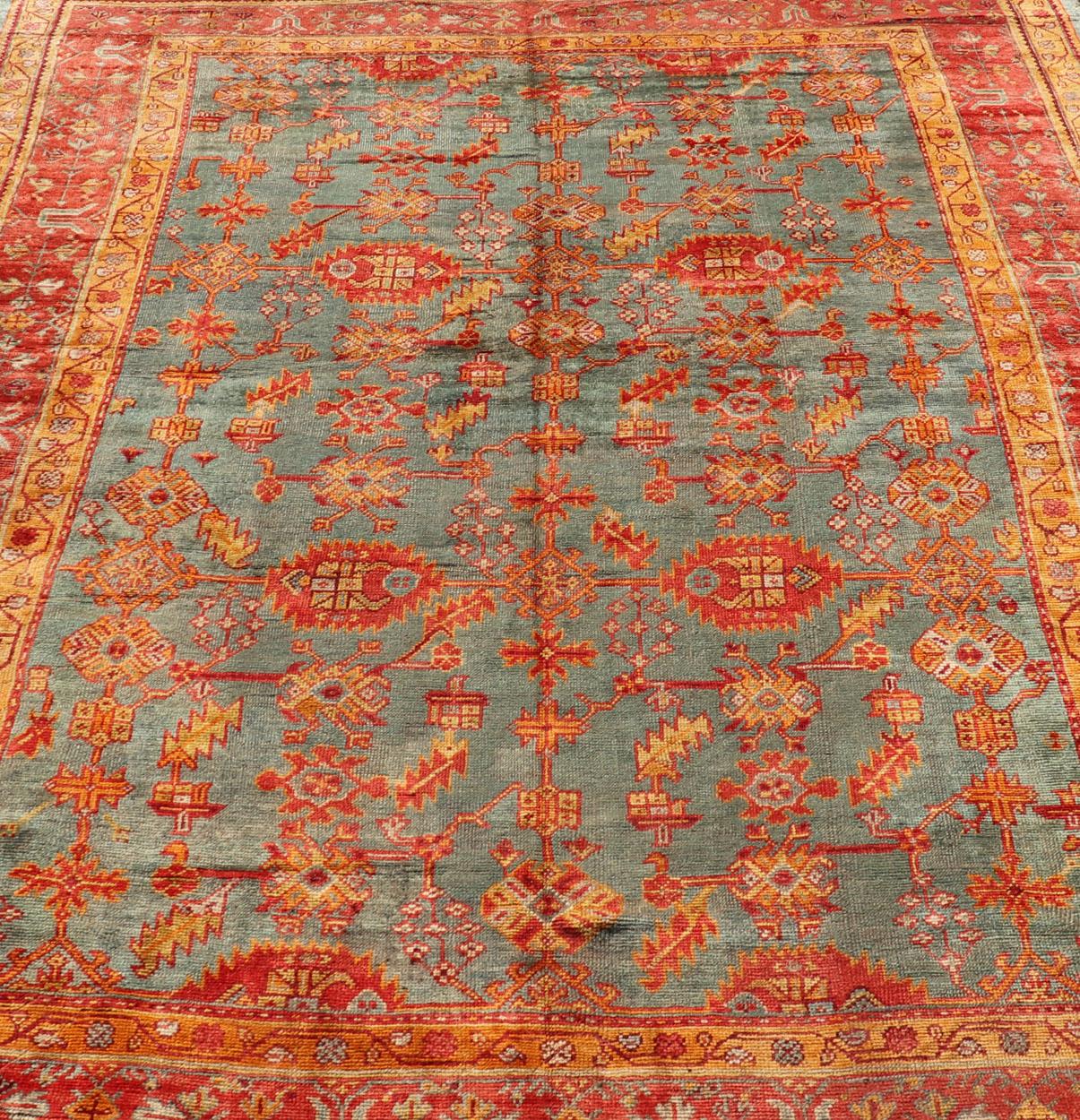 Early 20th Century Antique Turkish Oushak Rug with Flowers and Geometric  In Good Condition For Sale In Atlanta, GA