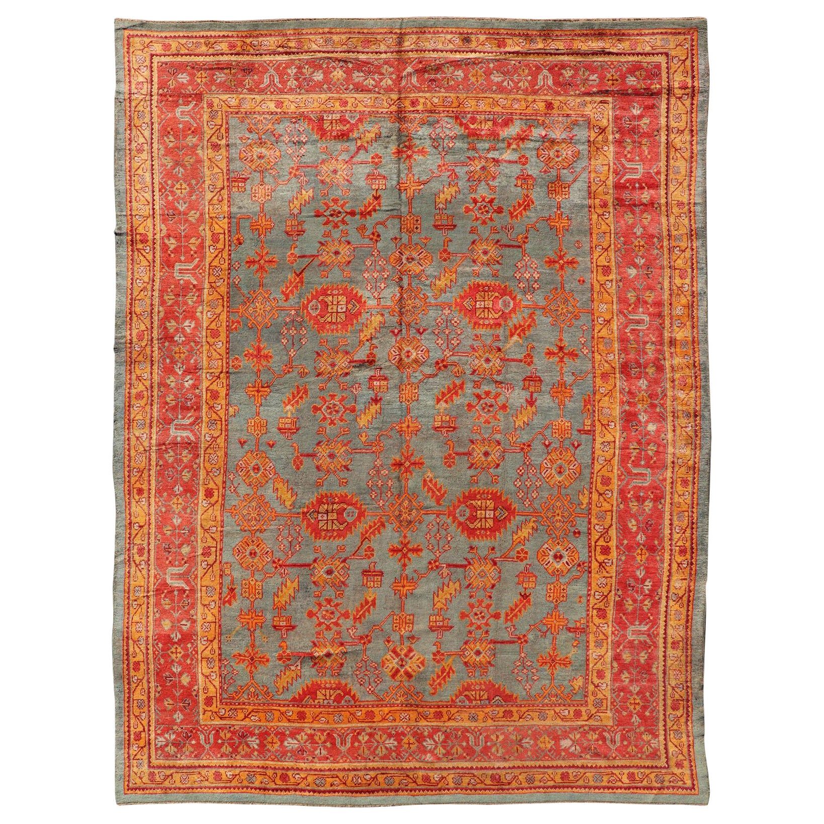 Tappeto Oushak turco antico dei primi del Novecento con fiori e motivi geometrici