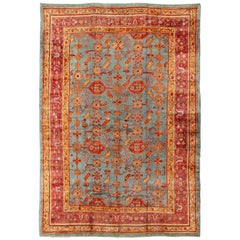 Early 20th Century Antique Turkish Oushak Rug with Flowers and Geometric in Blue