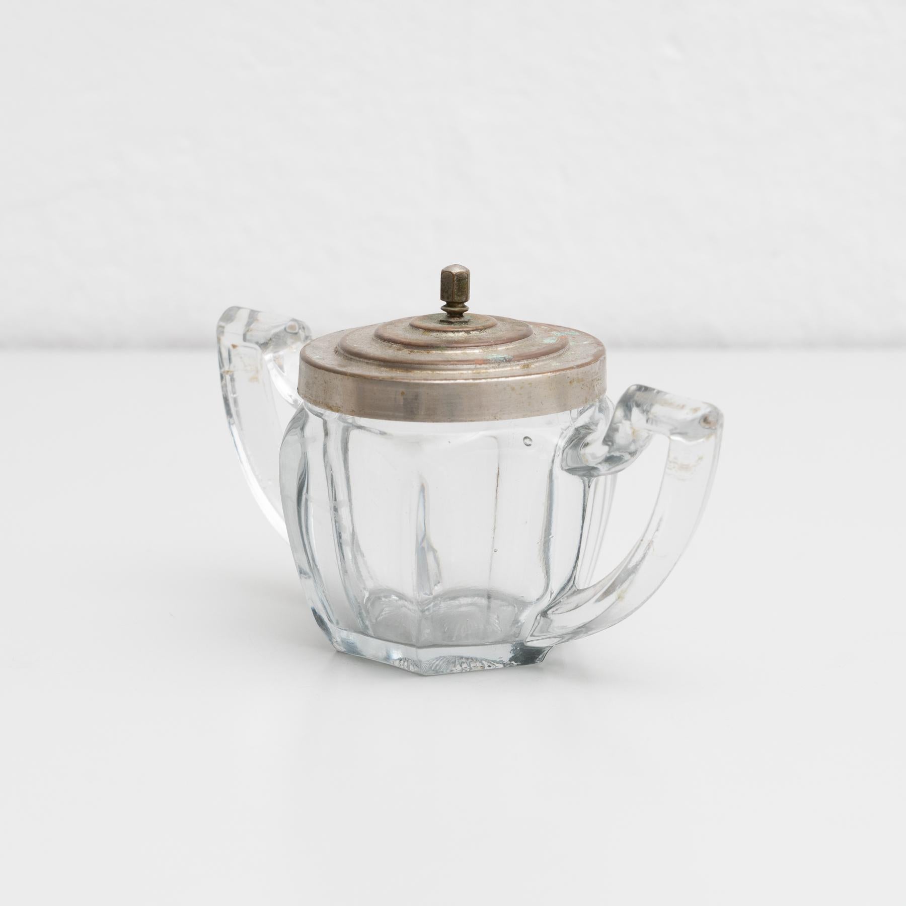 Antique Victorian style Spanish glass and silver lidded sugar pot with a swing handle and a pull off lid.

Made by unknown manufacturer, Spain, early 20th century.

In original condition, with minor wear consistent with age and use, preserving a