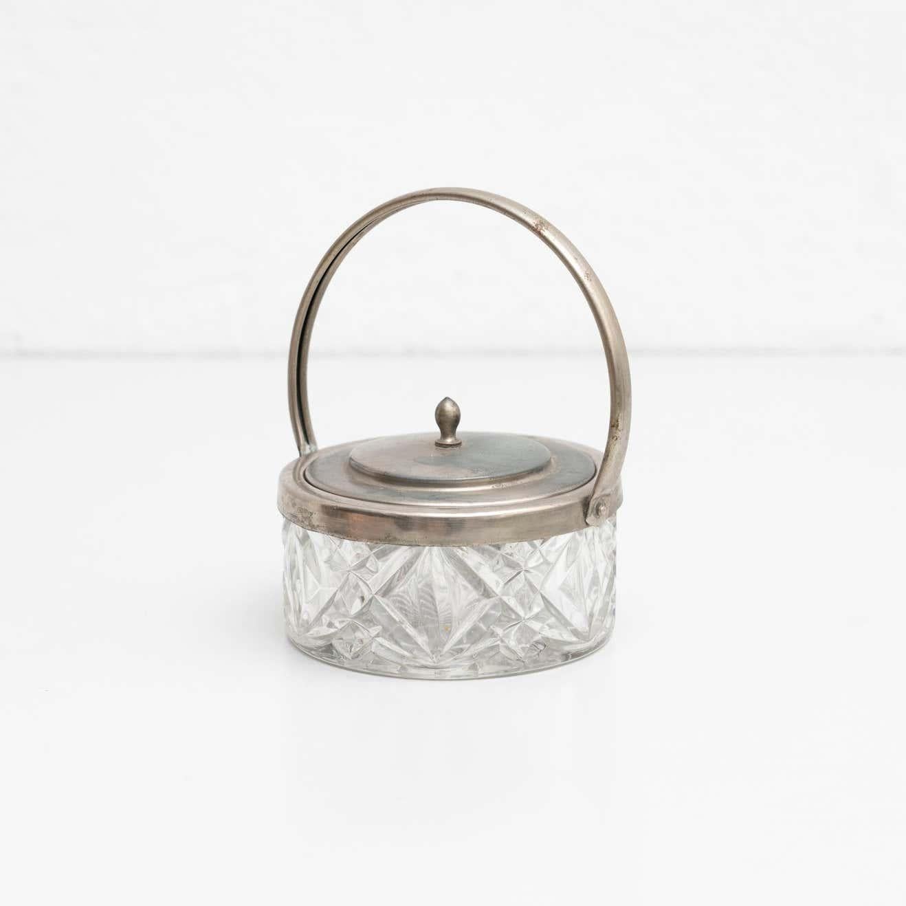 Antique victorian style Spanish glass and silver lidded sugar pot with a swing handle and a pull off lid.

Made by unknown manufacturer, Spain, early 20th century.

In original condition, with minor wear consistent with age and use, preserving a