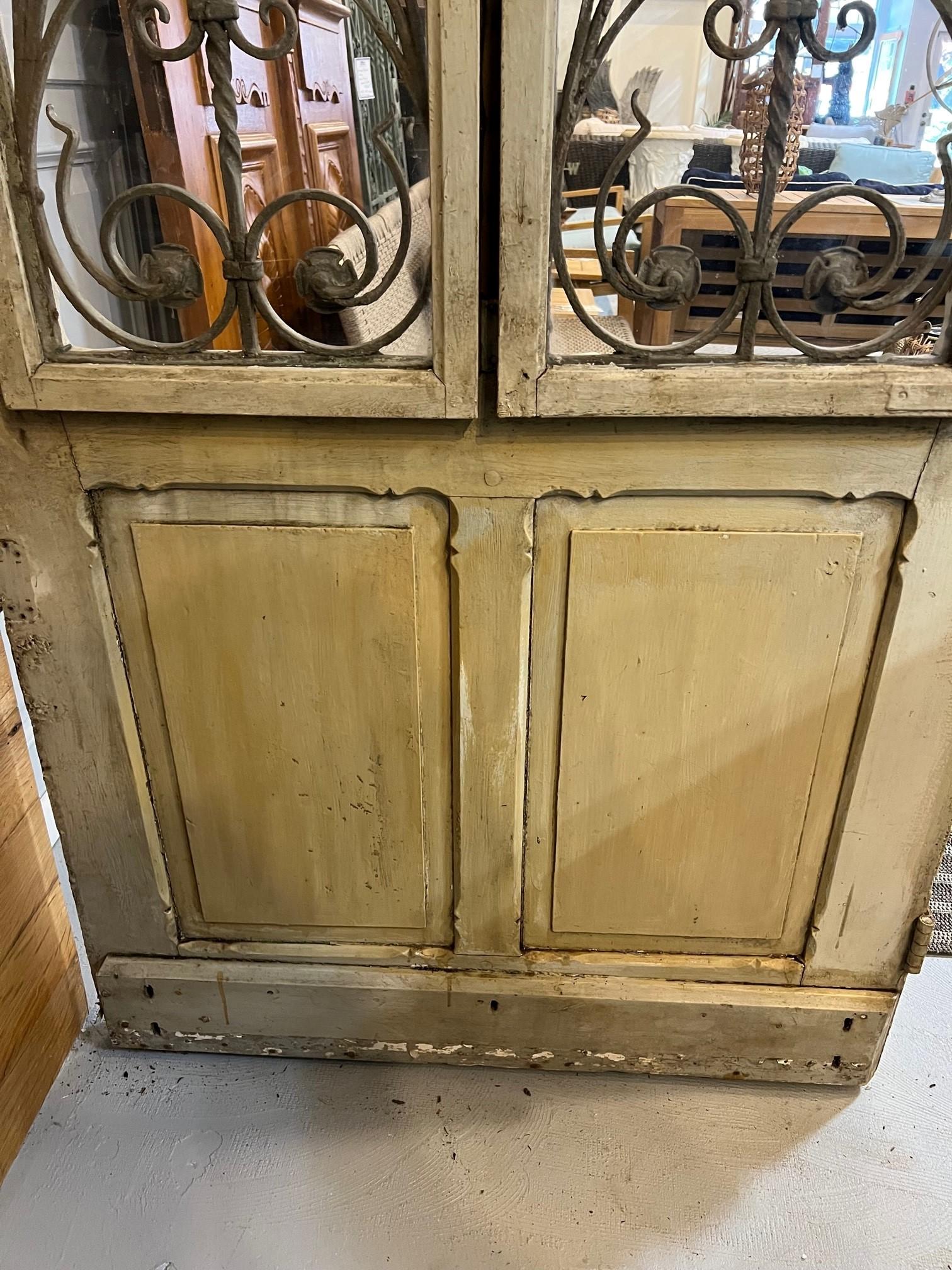Early 20th Century Antique Wood Door with Iron Panels and Glass Door Panels For Sale 5