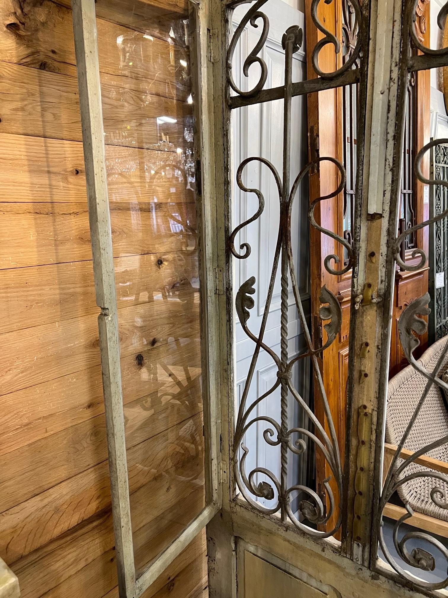 Early 20th Century Antique Wood Door with Iron Panels and Glass Door Panels For Sale 9