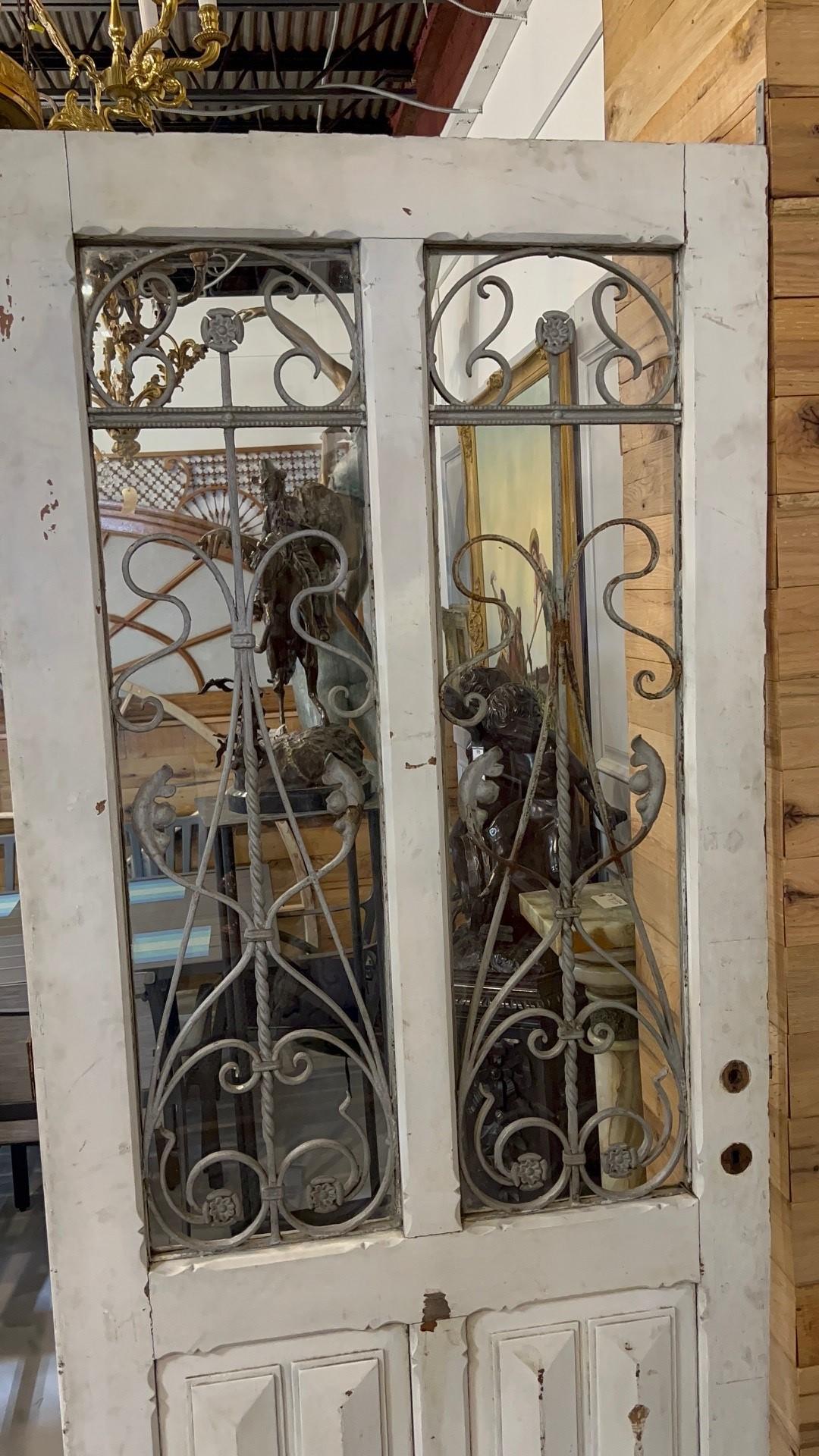 Early 20th Century Antique Wood Door with Iron Panels and Glass Door Panels For Sale 12