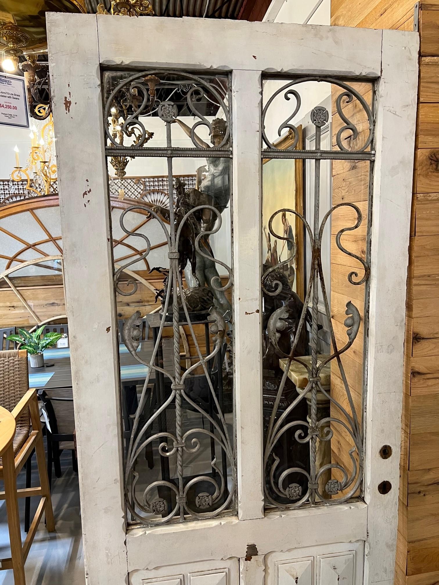 European Early 20th Century Antique Wood Door with Iron Panels and Glass Door Panels For Sale