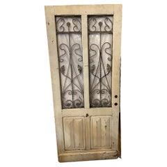Early 20th Century Antique Wood Door with Iron Panels and Glass Door Panels