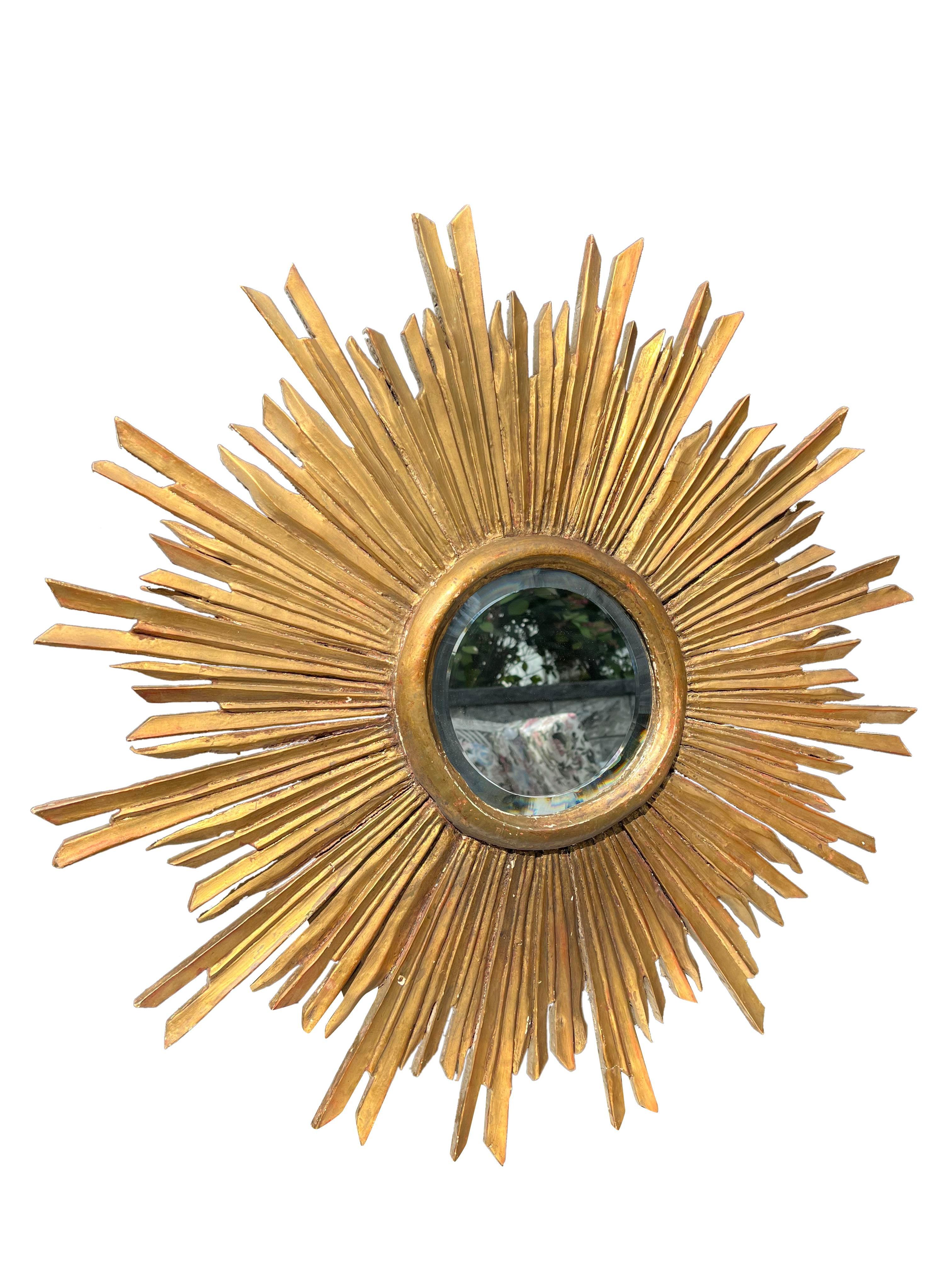 Antique Wood Gold Gilded Starburst Wall Mirror.

Elevate your interior with this stunning Antique Wood Gold Gilded Starburst Wall Mirror. This unique piece showcases the exquisite craftsmanship and timeless design of the Regency era.

Key