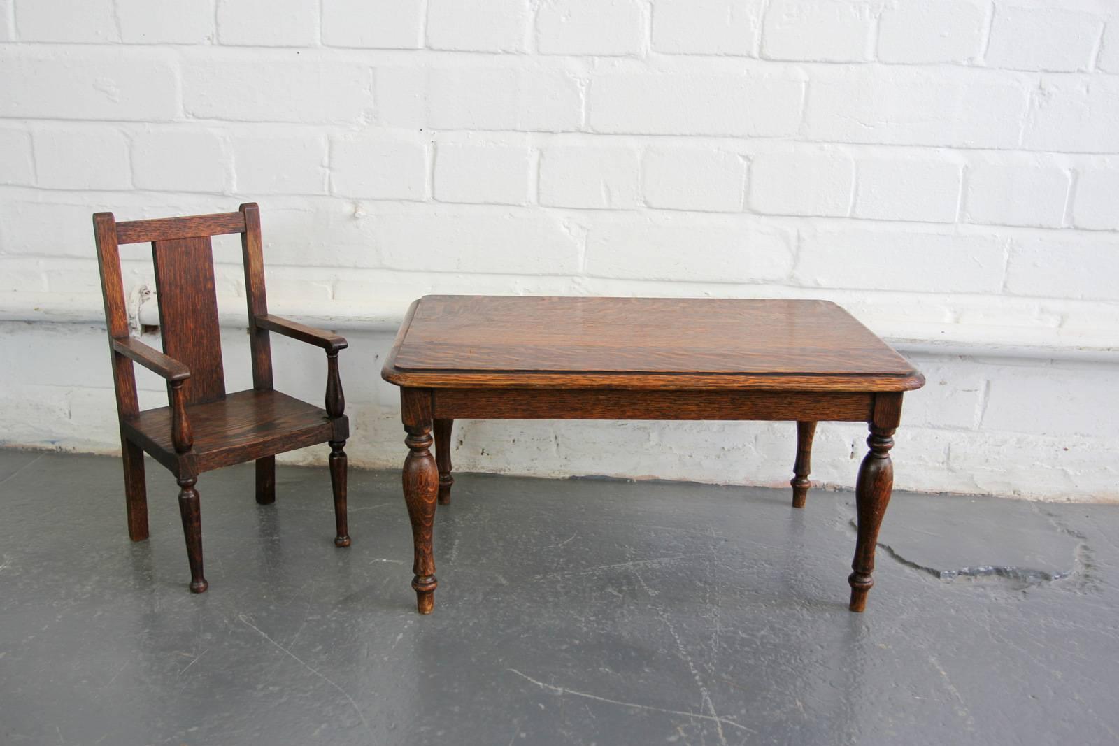 Early 20th century apprentice made model table and chair

- Made from solid mahogany
- Hand-turned legs on the chair and table
- Would have been made by a carpenters apprentice 
- English, circa 1910
- Chair measures 18cm wide x 16cm deep x