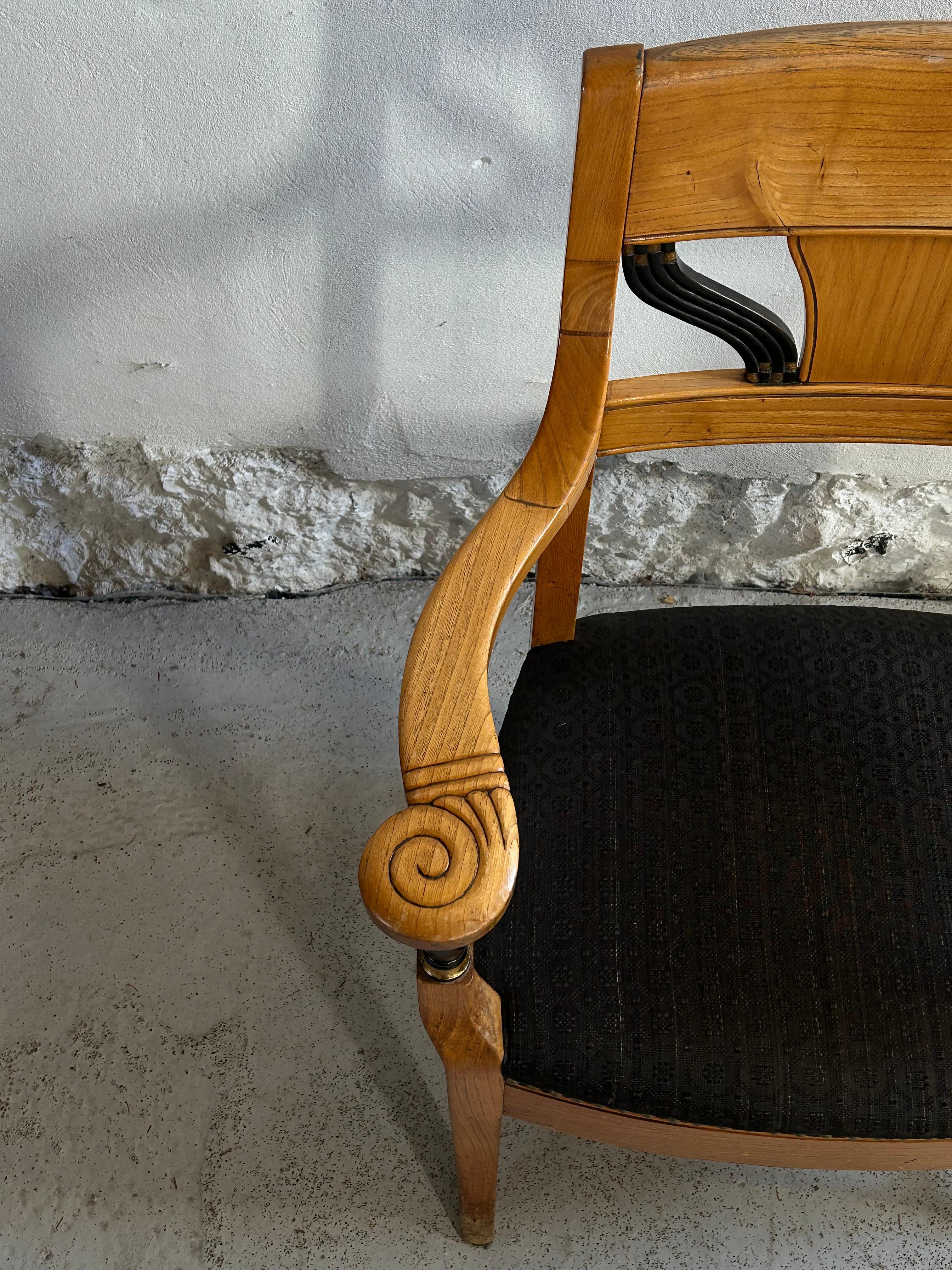 A rare and architecturally significant armchair designed by Jens Møller Jensen around 1910 for the Hovedstadens Forskønnelses Boardroom in Denmark. This striking piece exemplifies early 20th-century Danish design, blending classicism with modernist