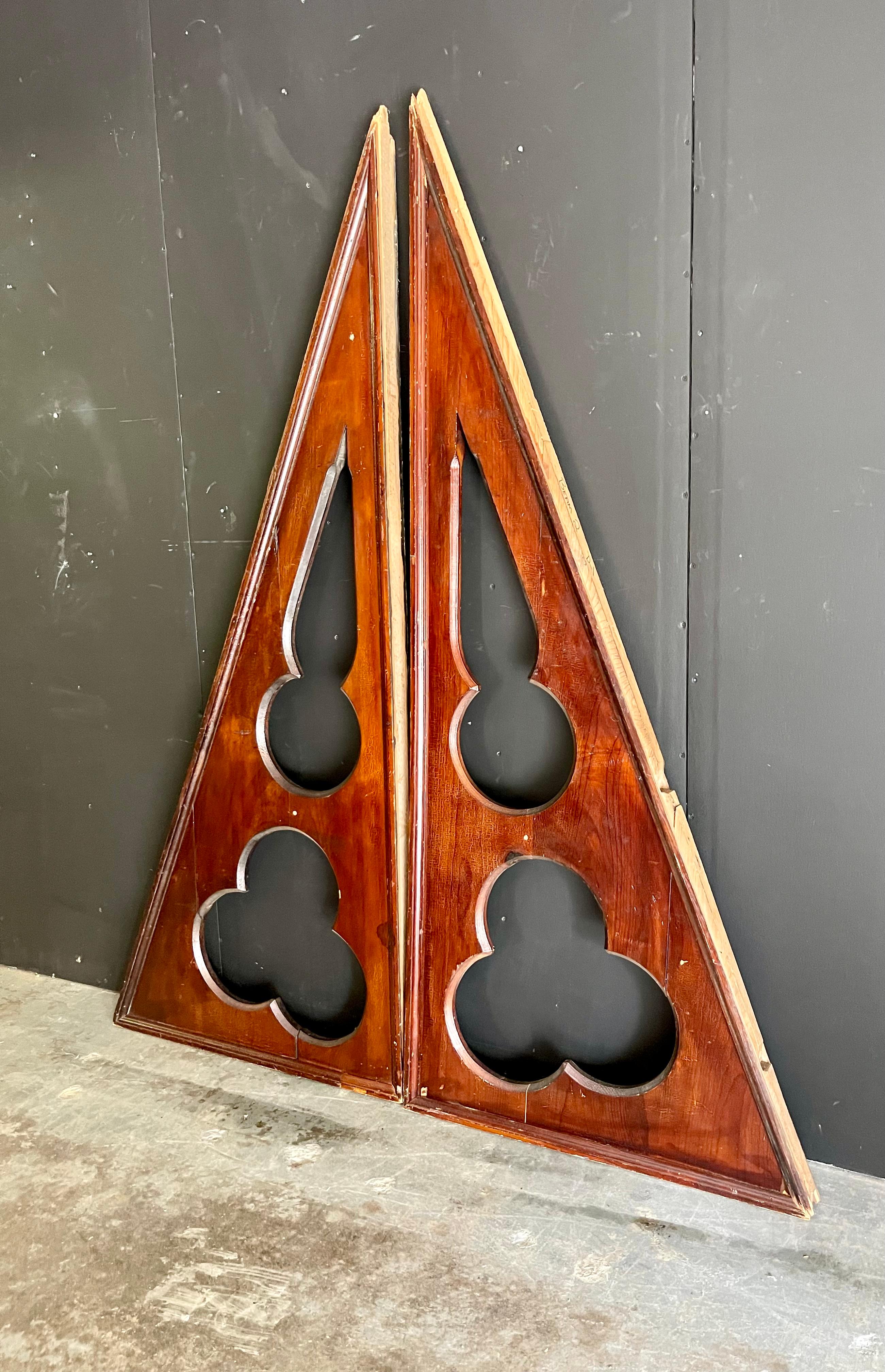 Wonderful pair of Mid Century gabled church corbels with 3 leaf clover cut out saved from demolition from a St. Louis Methodist church. Beautiful rich wood tones add style and warmth with a touch of modern. Would be great incorporated into a new