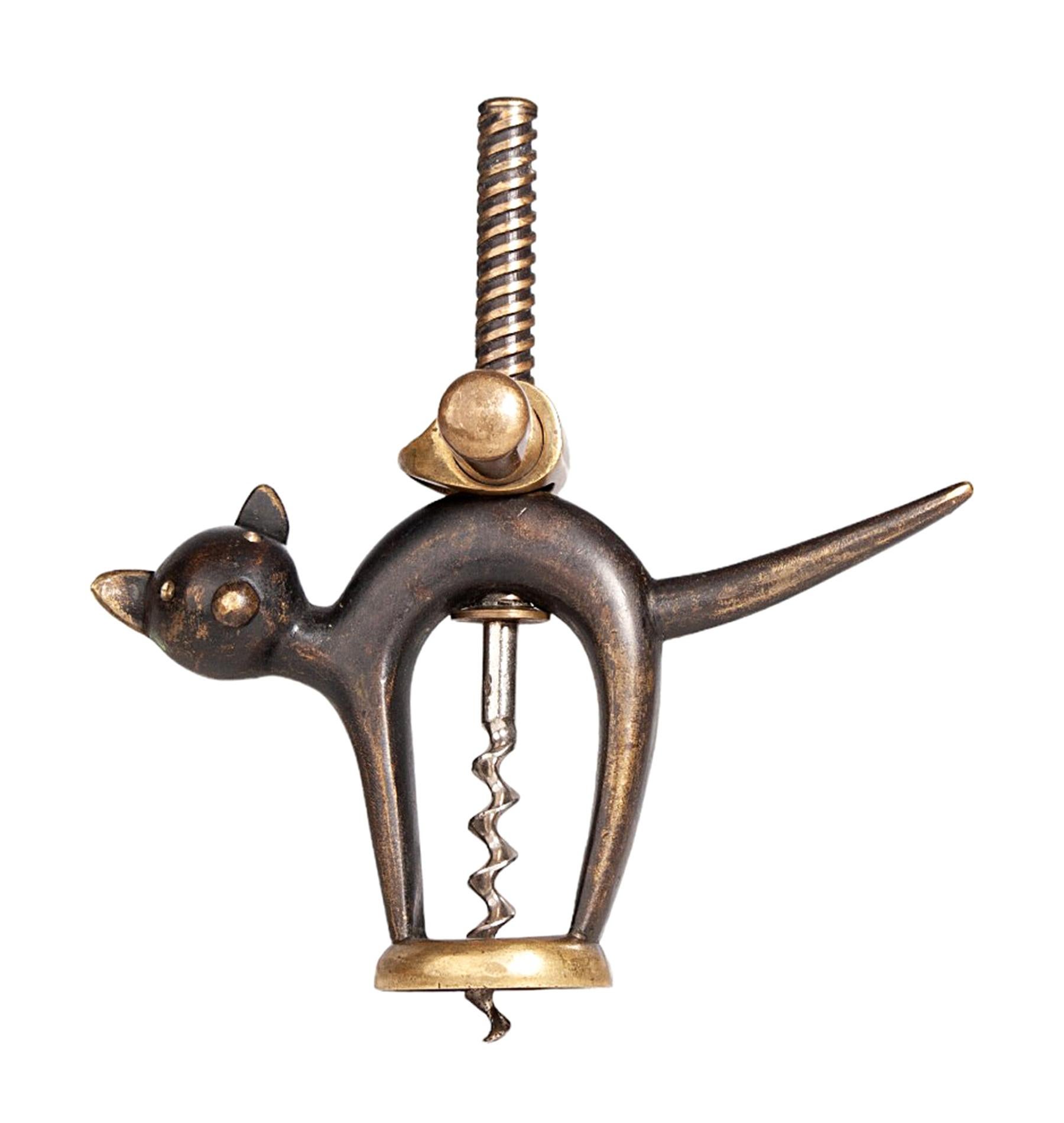 Early 20th century Art Déco black and golden brass cat corkscrew, Germany

By: unknown
Material: brass, metal, copper, bronze, zinc
Technique: polished, metalwork, cast, molded
Dimensions: 1.5 in x 5 in x 5.5 in
Date: early 20th century
Style: Art