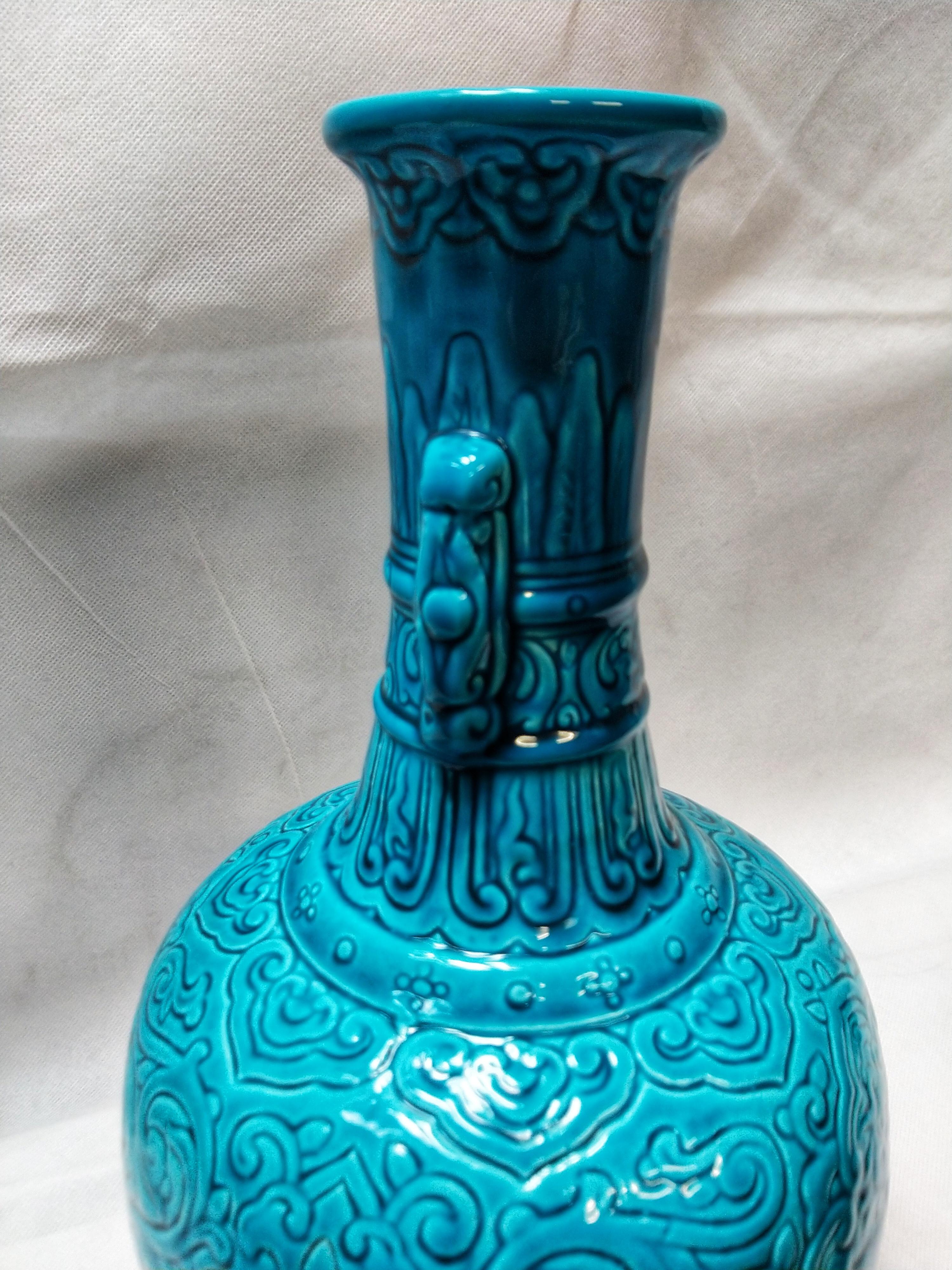 Beautiful French Sevres vase, early 20th century blue in oriental style by Paul Minet.

Paul Milet is a French ceramist, born January 25, 1870 in Sèvres and died after October 4, 1930.
Paul Milet is the son of ceramist Felix Optat Milet (1838-1911).