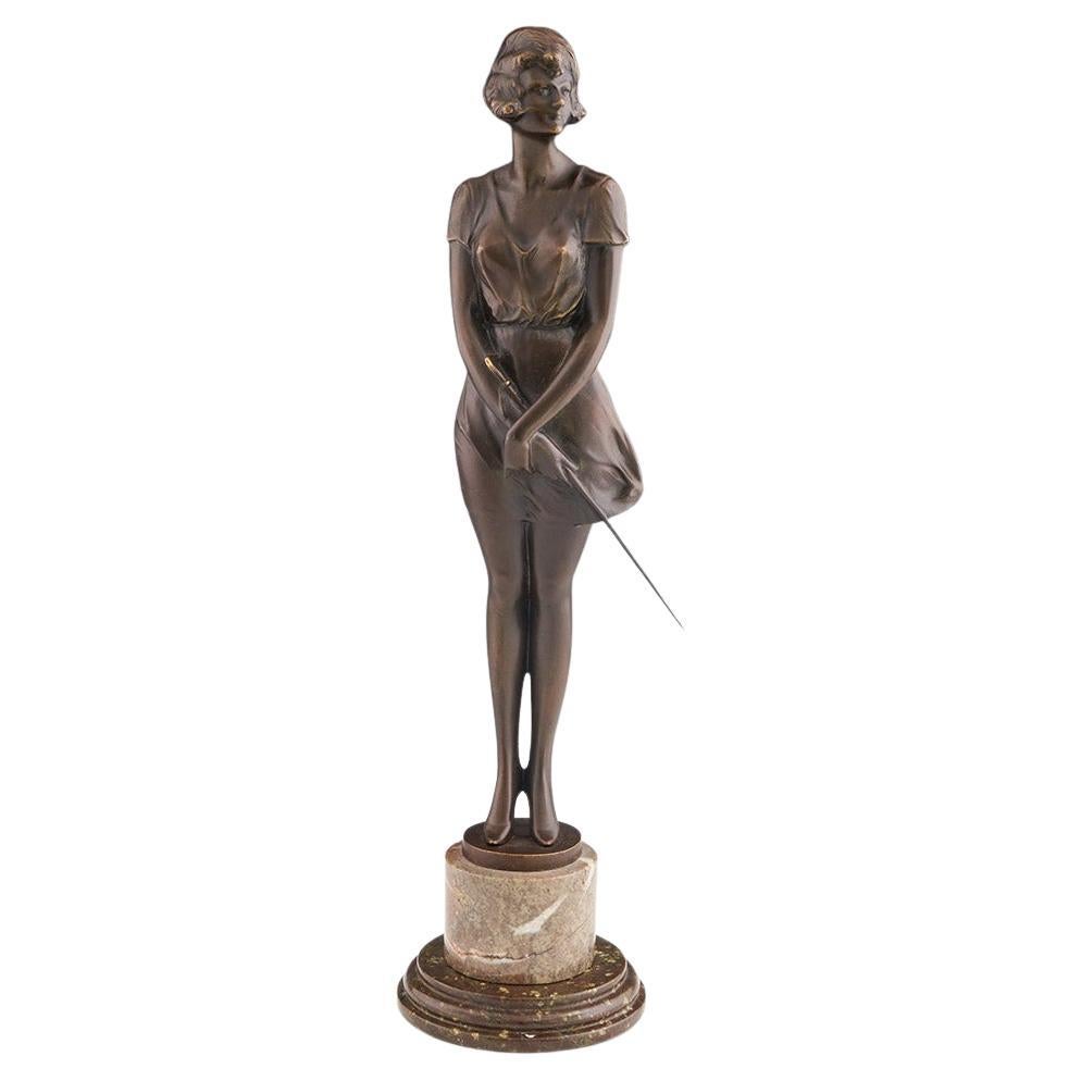 Escultura Art Decó de bronce de principios del siglo XX titulada "Chica del látigo" de Bruno Zach