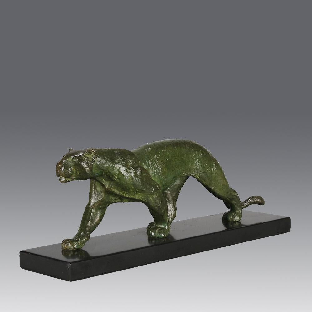 

A majestic Art Deco bronze study of a walking panther with excellent deep green patination and a very fine smooth tactile surface, raised on a polished black marble rectangular base and signed I Rochard
ADDITIONAL INFORMATION                      