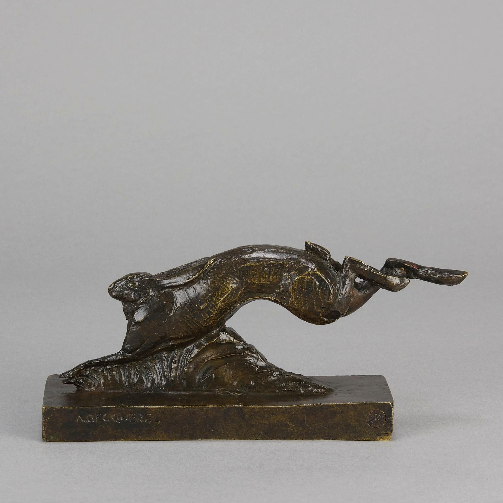 An excellent early 20th Century Art Deco bronze study modelled as a stylised running hare with very fine colour lightly rubbed to a golden hue and good hand finished surface detail. Raised on a naturalistic rectangular plinth and signed Becquerel