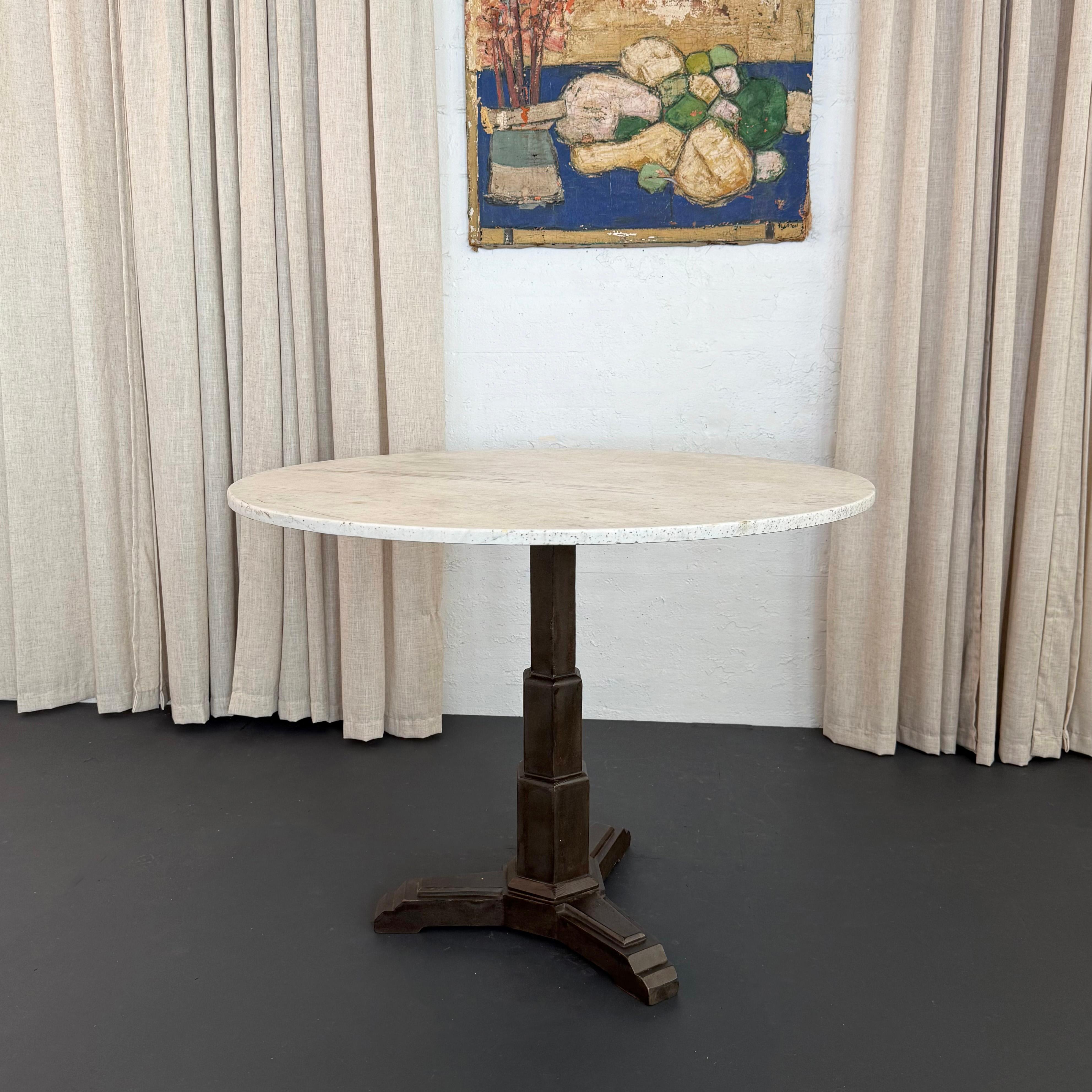 This round, Art Deco, café, bistro, or dining table circa 1930s features a vintage 40