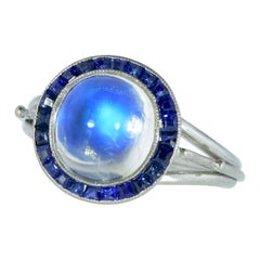 Early 20th Century, Art Deco Natural Moonstone & Sapphire Platinum Ring, c. 1925