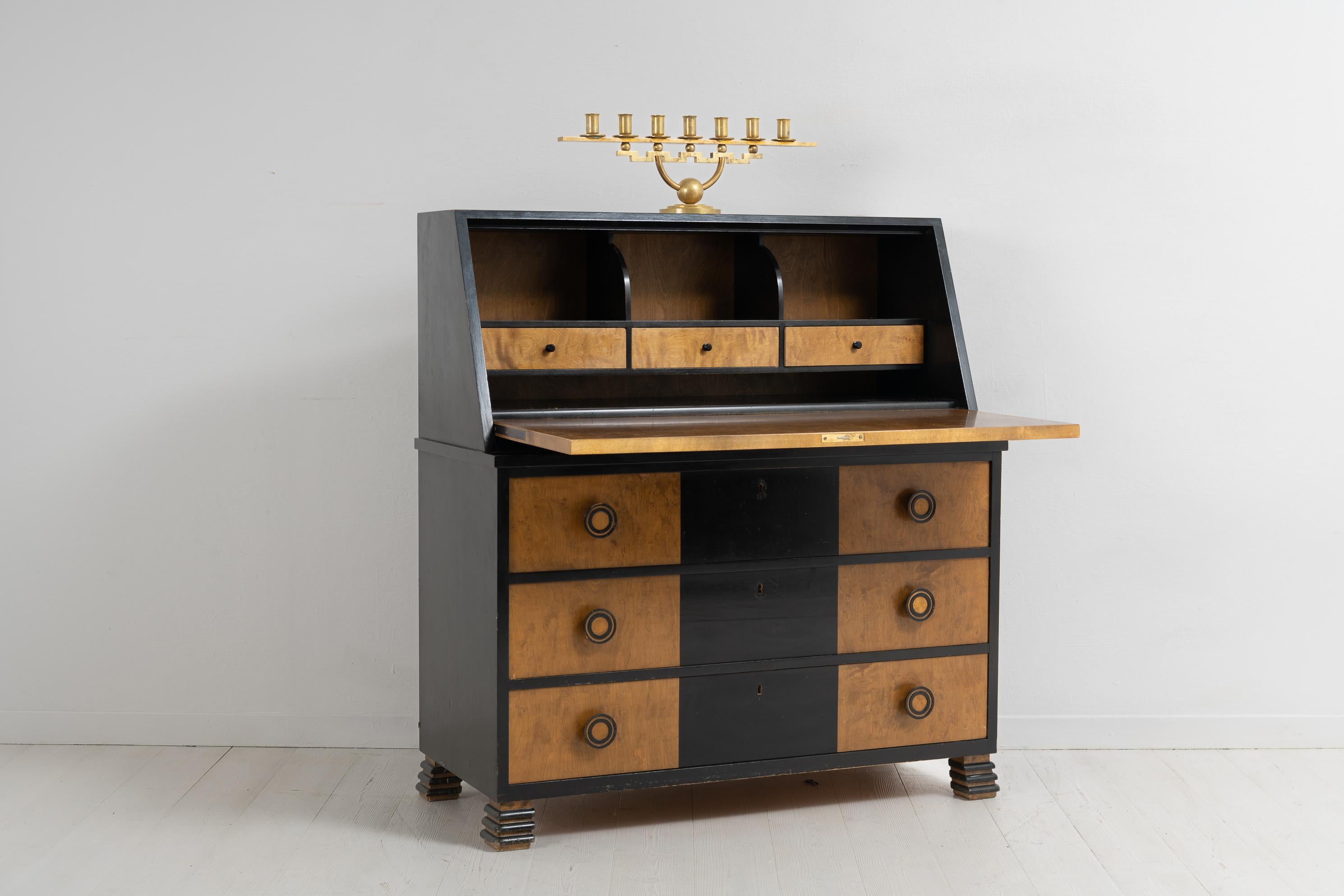 Otto Schulz Art Deco secretary for Boet, Gothenburg. The secretary is a modern classic from the 1930s and plays well into the classical elements of the Art Deco era. The sharp geometric lines and contrasting colours, the warmer wood and distinct