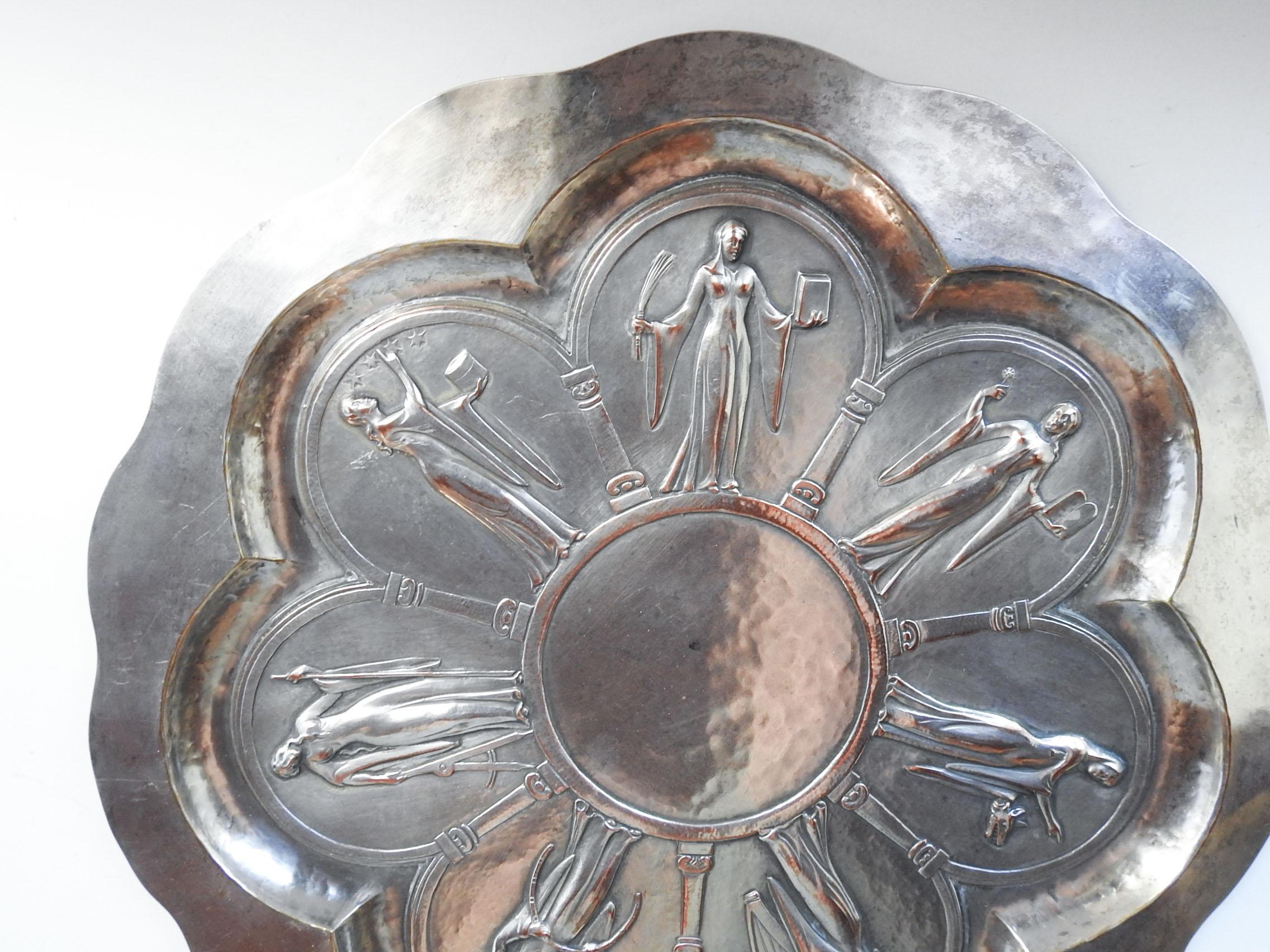 Art Deco silverplate tray featuring the 7 muses. No markings, hand hammered body silver plate with cast center decoration which is silver over copper. Each figure is 3