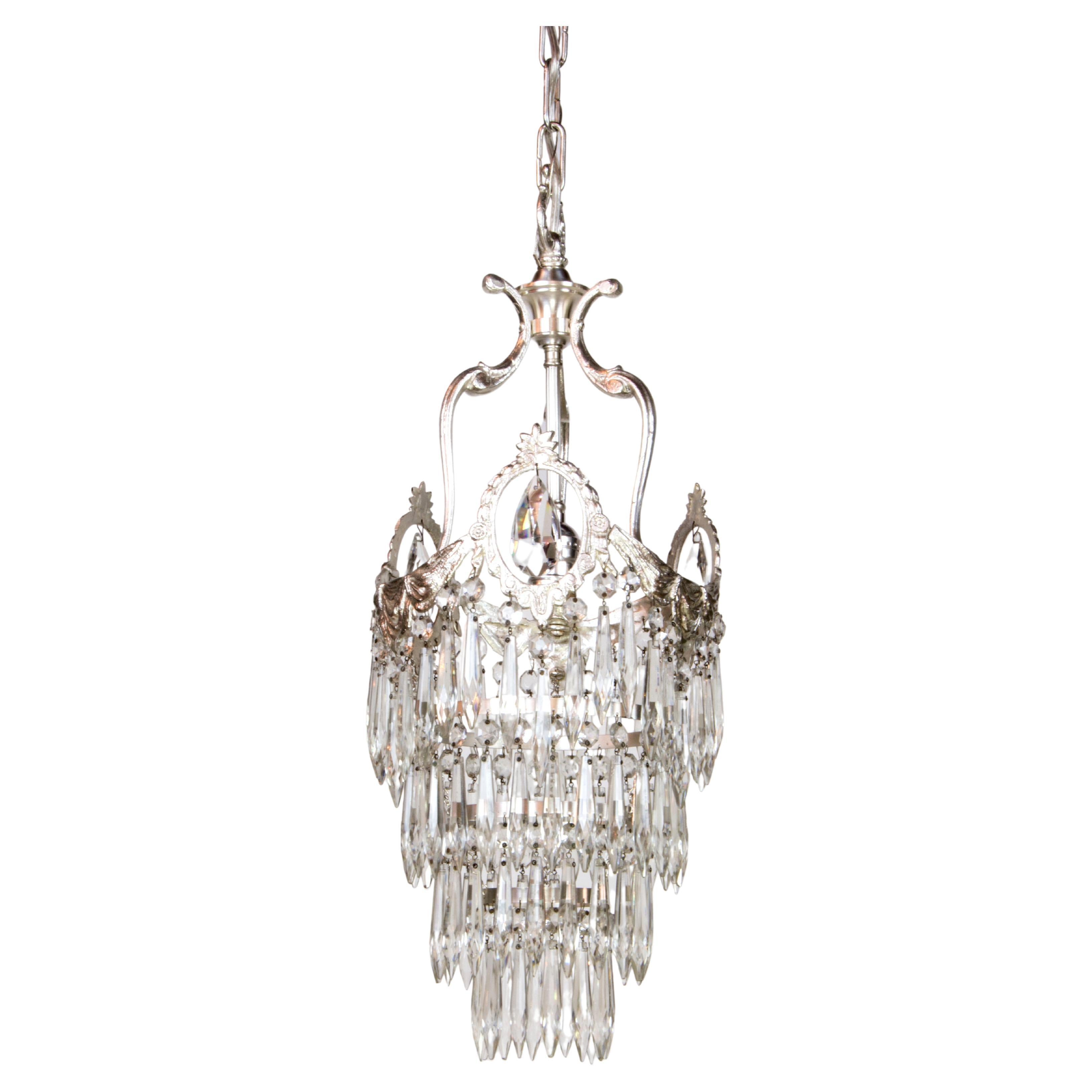 Early 20th Century Art Deco Tiered Silver and Crystal Pendant For Sale