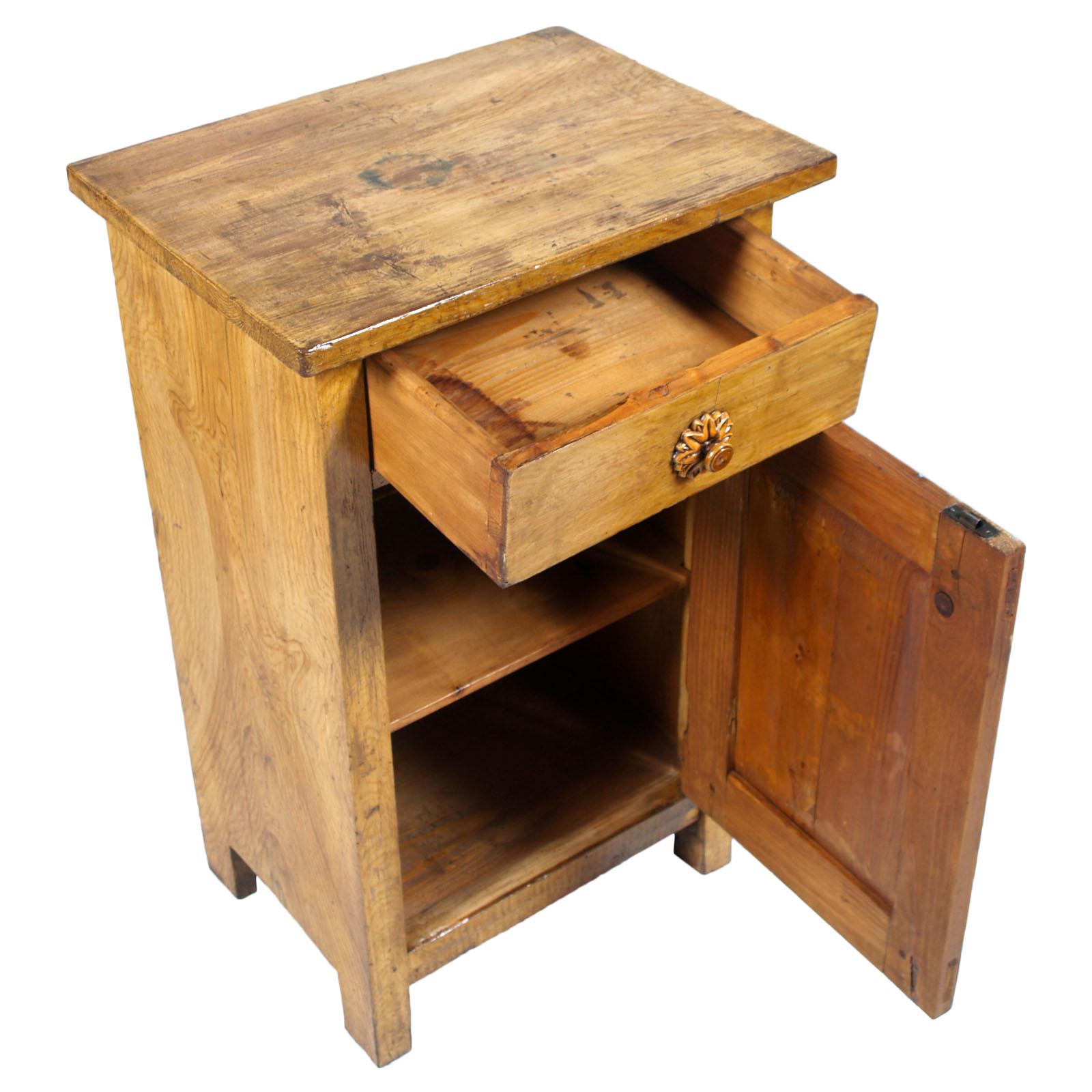 Italian early 20th century Art Nouveau country rustic nightstand cabinet restored and polished to wax, in all massive pine.

Measure cm: H 79, W 48, D 35.