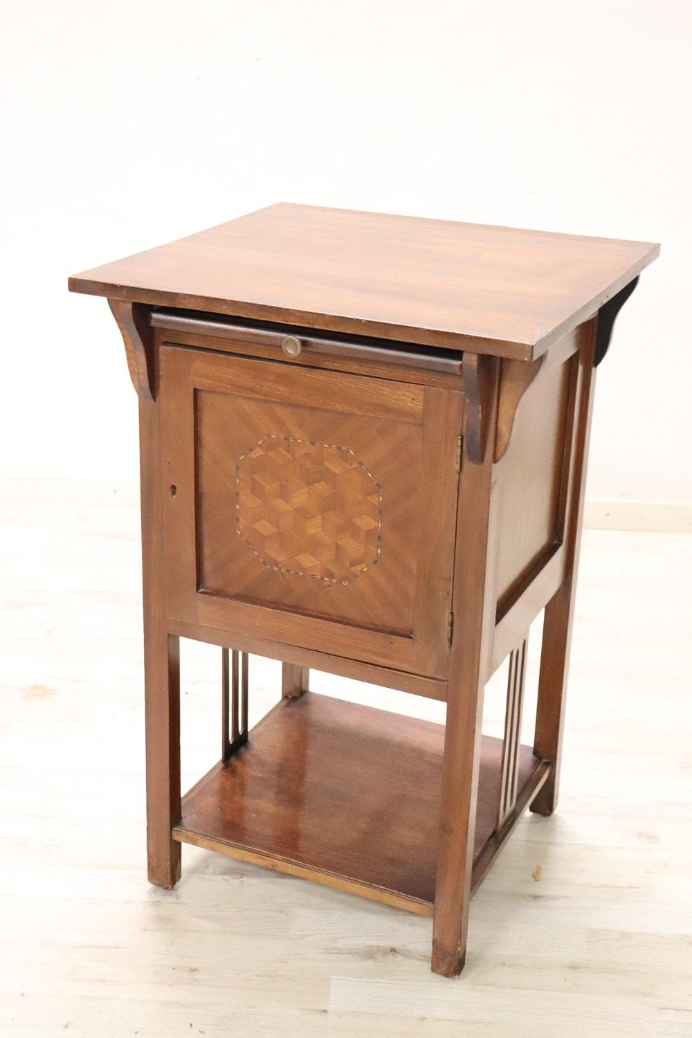 Lovely italian of the period art nouveau side table. The table with a inlaid decoration on the front. Look at every little detail of this beautiful side table. Perfect conditions.