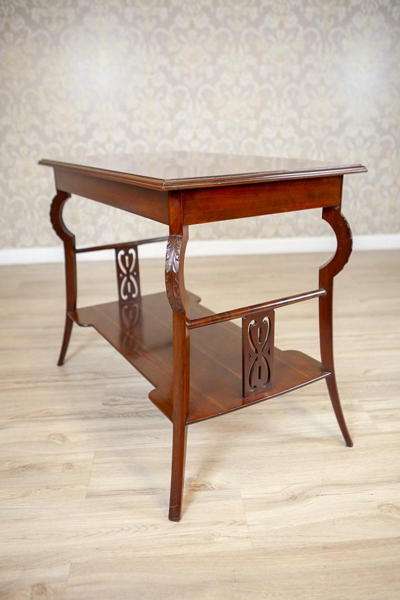 Mahogany Coffee Table in the Art Nouveau Style, Early 20th Century

This elegant Art Nouveau mahogany table is a beautifully restored piece dating back to the early 20th century. Featuring a refined rectangular top, it is supported by gracefully