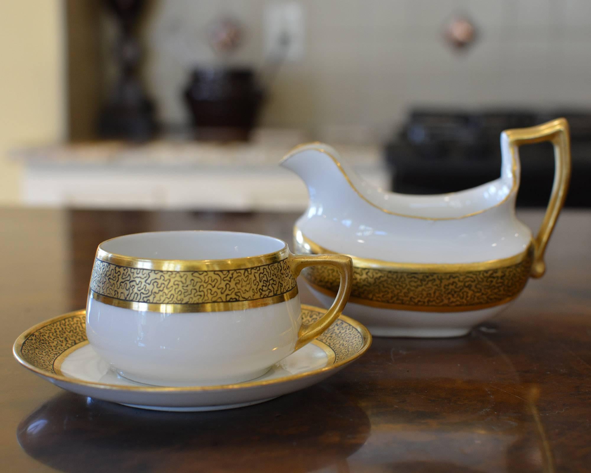 Early 20th Century Art Nouveau Porcelain Cup, Saucer and Creamer Set 1
