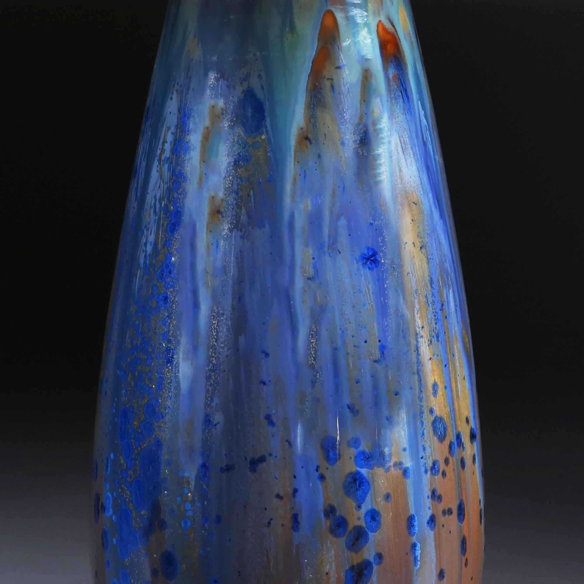 An early 20th century art pottery vase by Pierrefonds, with blue and gold glaze in drip and crystalline glaze formations. Now mounted as a lamp.

Stamped to the base, Pierrefonds.

Please note: lampshade not included.

Currently wired for the UK.