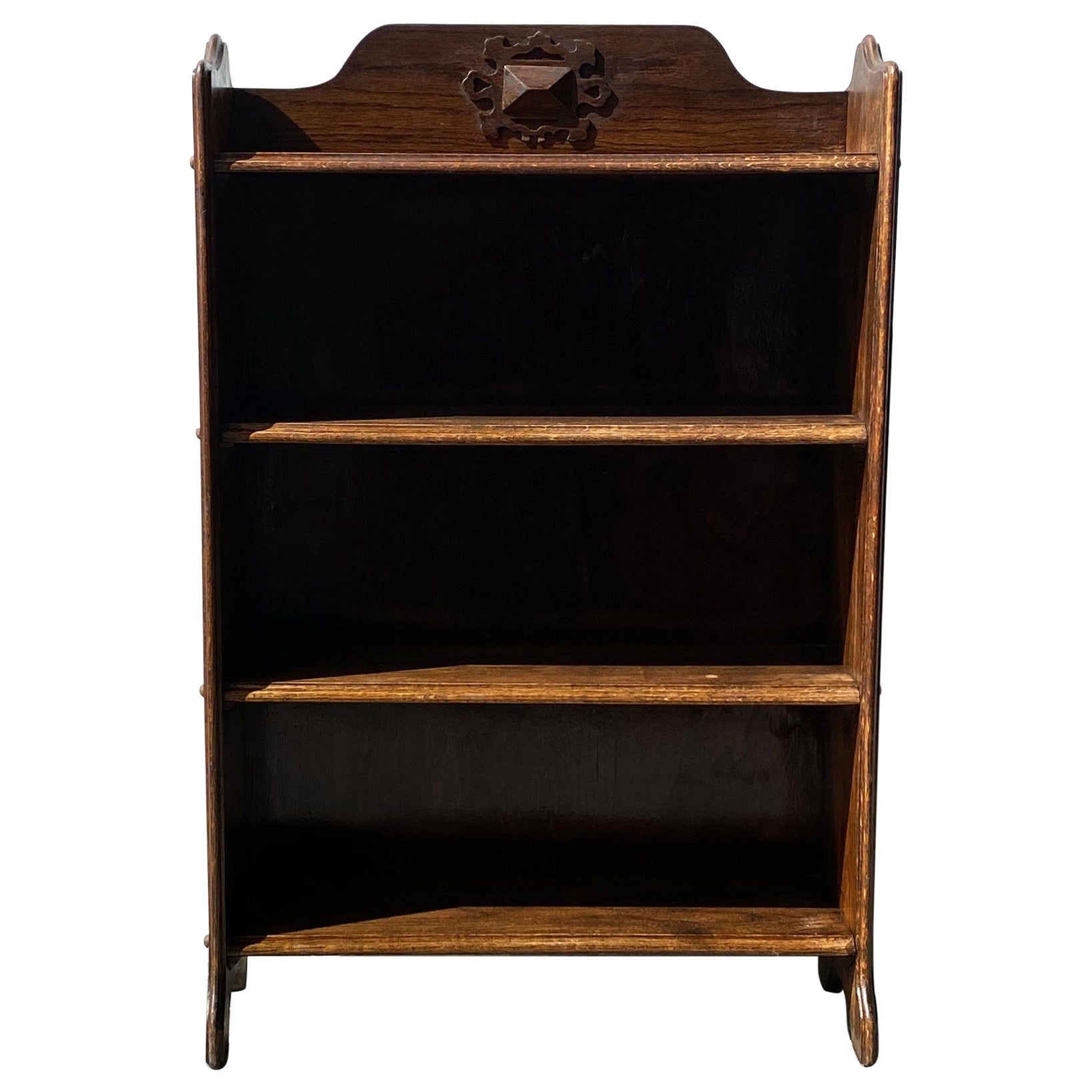 Early 20th century Arts and Crafts oak book shelves