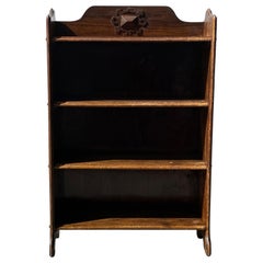 Early 20th century Arts and Crafts oak book shelves