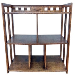 Early 20th century Arts & Crafts oak wall shelf, 1920s