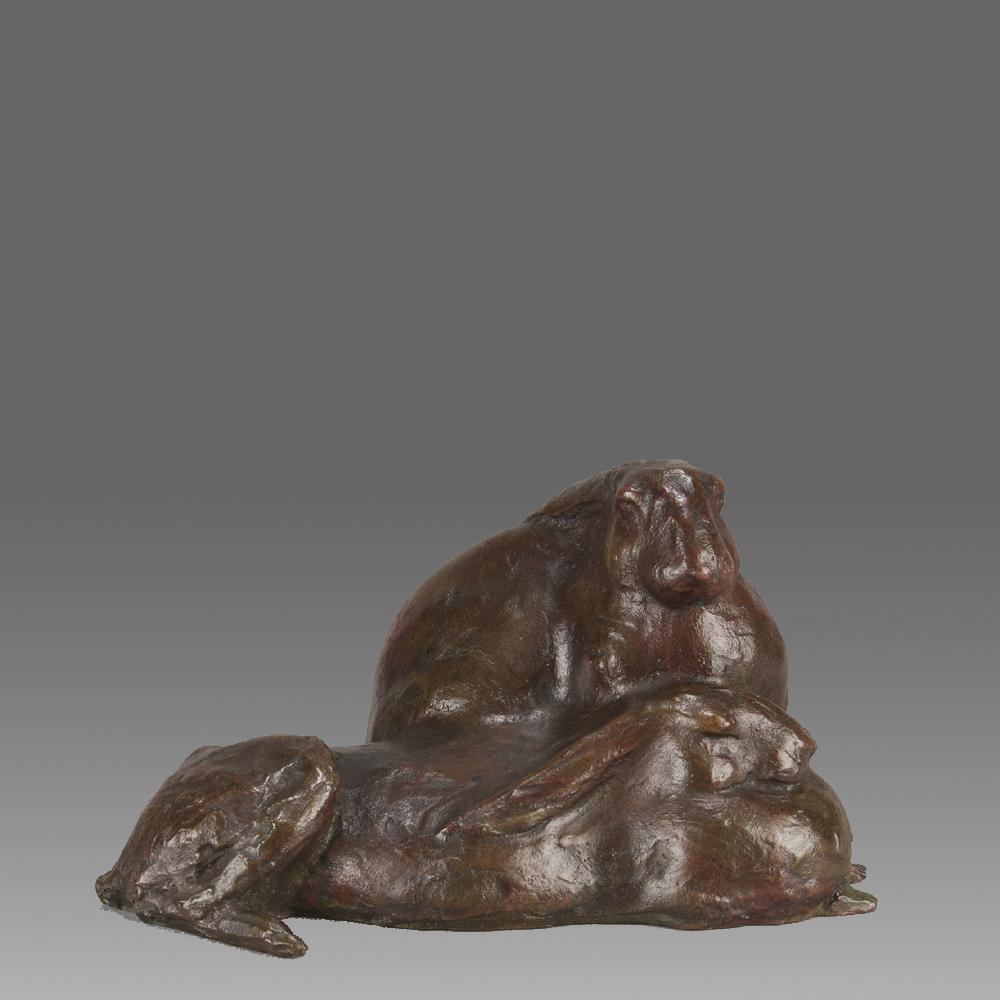 An endearing early 20th Century Asian bronze study of two resting rabbits the bronze with very fine red and rich brown patina and good detail, signed with oriental mark

ADDITIONAL INFORMATION
Height:                                      9.5