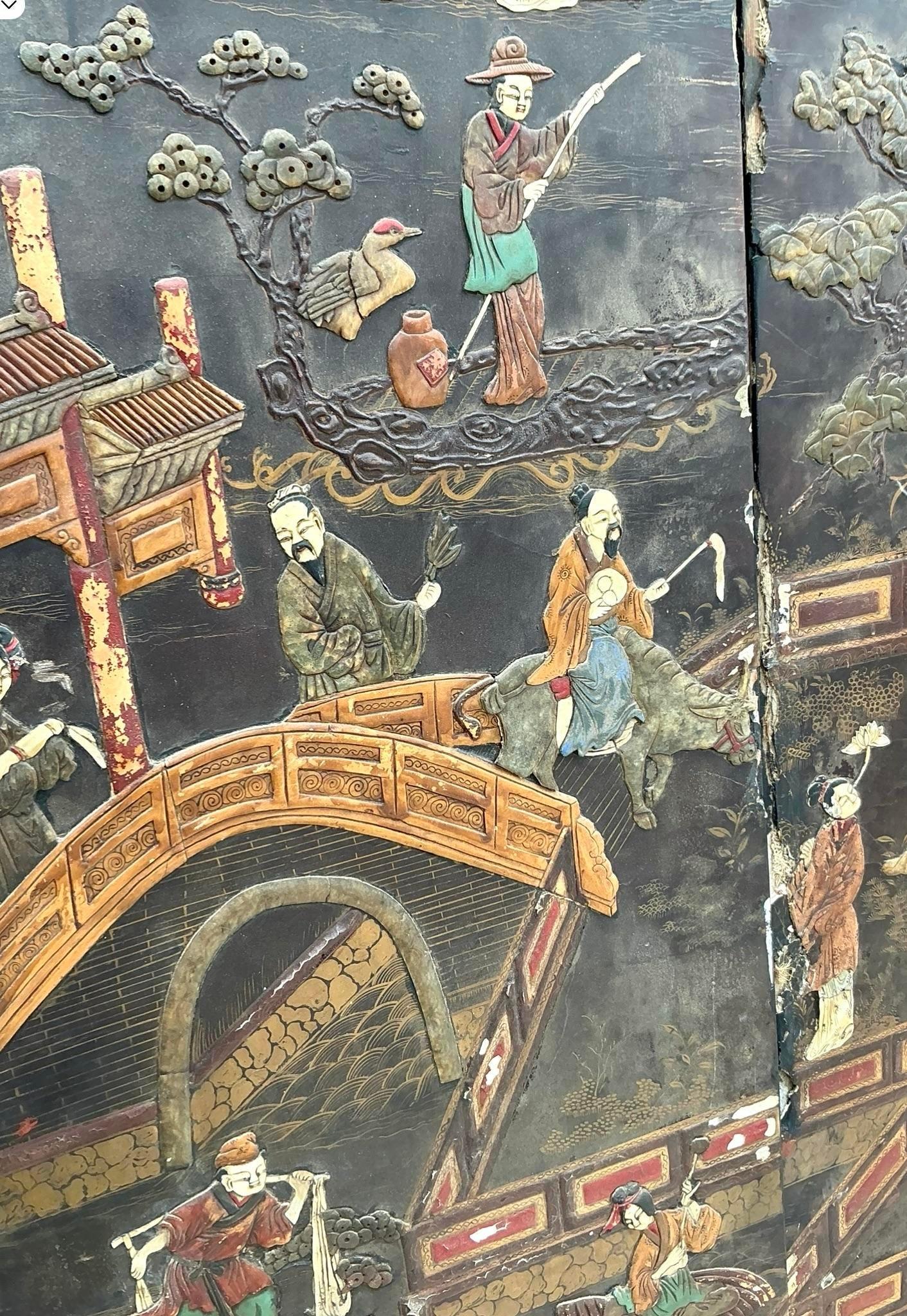 The Vintage Asian Distressed 8 Panel Coromandel Screen merges exotic elegance with American vintage charm. This intricately detailed screen, with its distressed finish, adds a touch of historical beauty and sophistication to any interior space. All