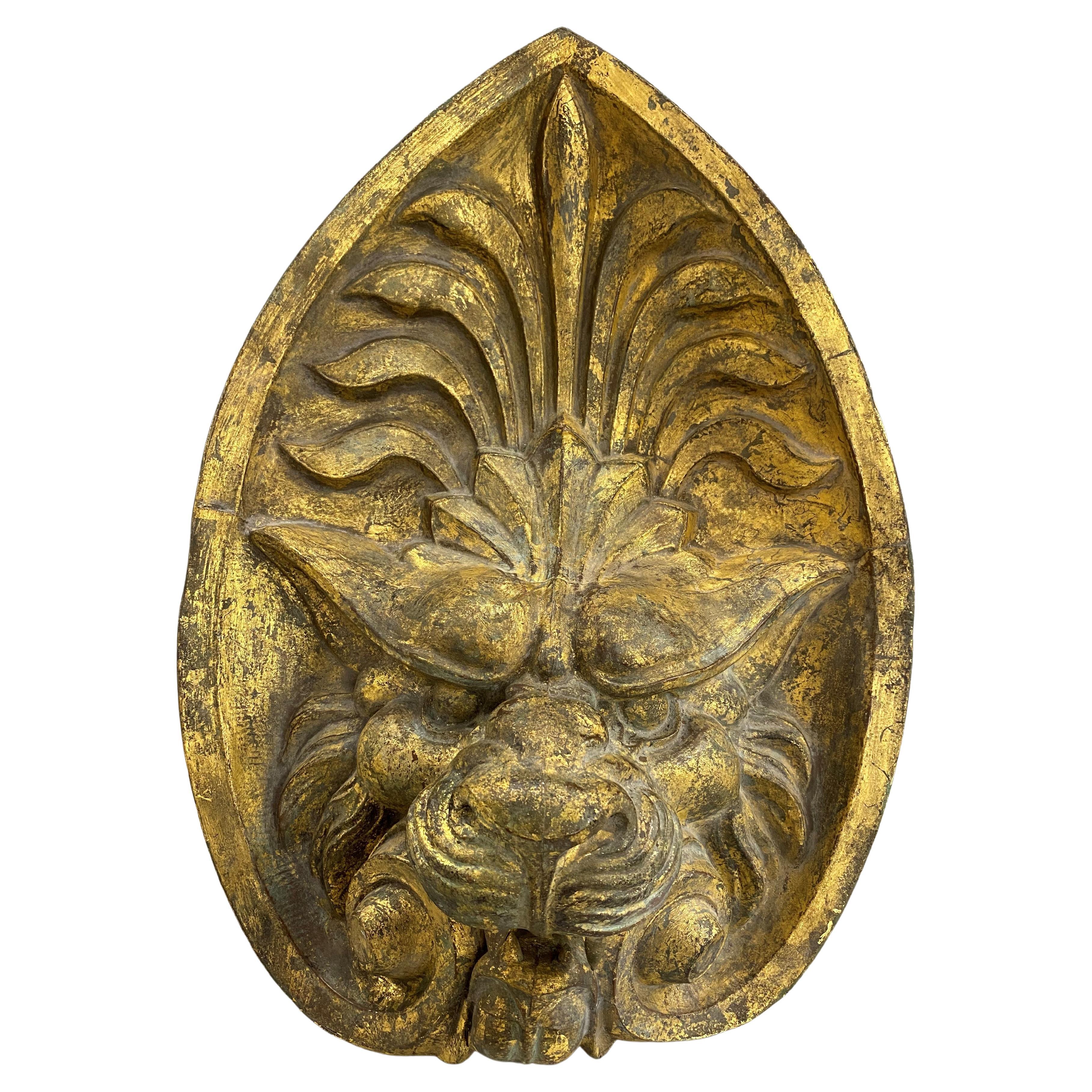 Early 20th Century Asian Gilded Copper Relief Lion’s Head For Sale