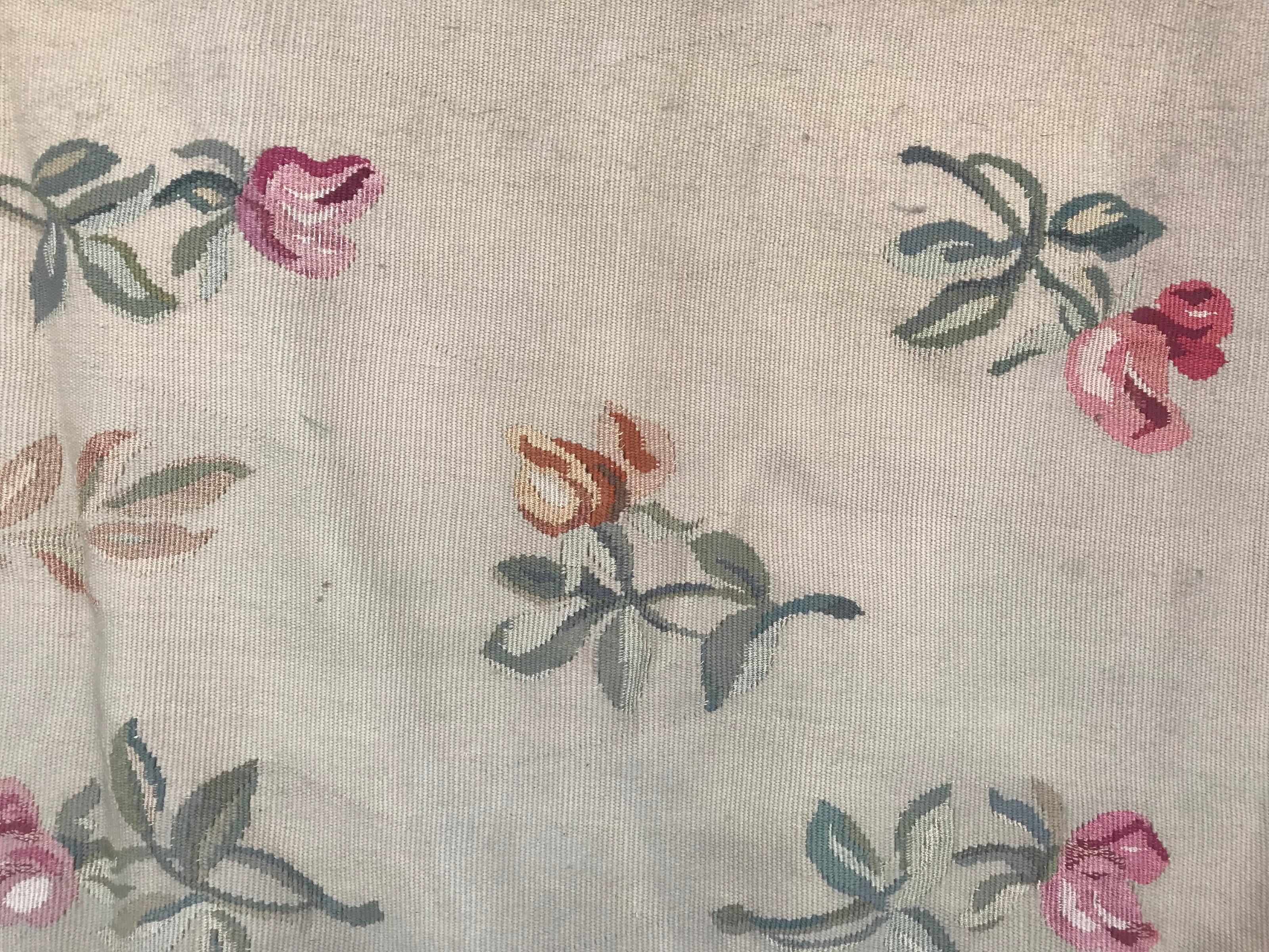 Beautiful Aubusson tapestry with a floral design and beautiful colors entirely handwoven with wool and silk on cotton foundation, with a shape of down of bed.