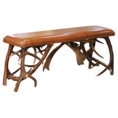 Early 20th Century Austrian Black Forest Antler Bench with Leather Seat Early 20th Century Austrian Black Forest Antler Bench with Leather Seat