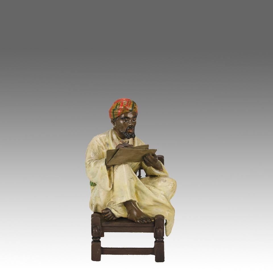 A very fine early 20th Century cold painted Austrian bronze study of an Arab man seated upon a chair writing on his sheet of papyrus paper. The bronze exhibiting excellent colour and detail, signed with the Bergman ‘B’ in an amphora vase