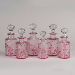 Early 20th Century Baccarat Pink Overlay Wild Rose Perfume Bottles, Set of Six