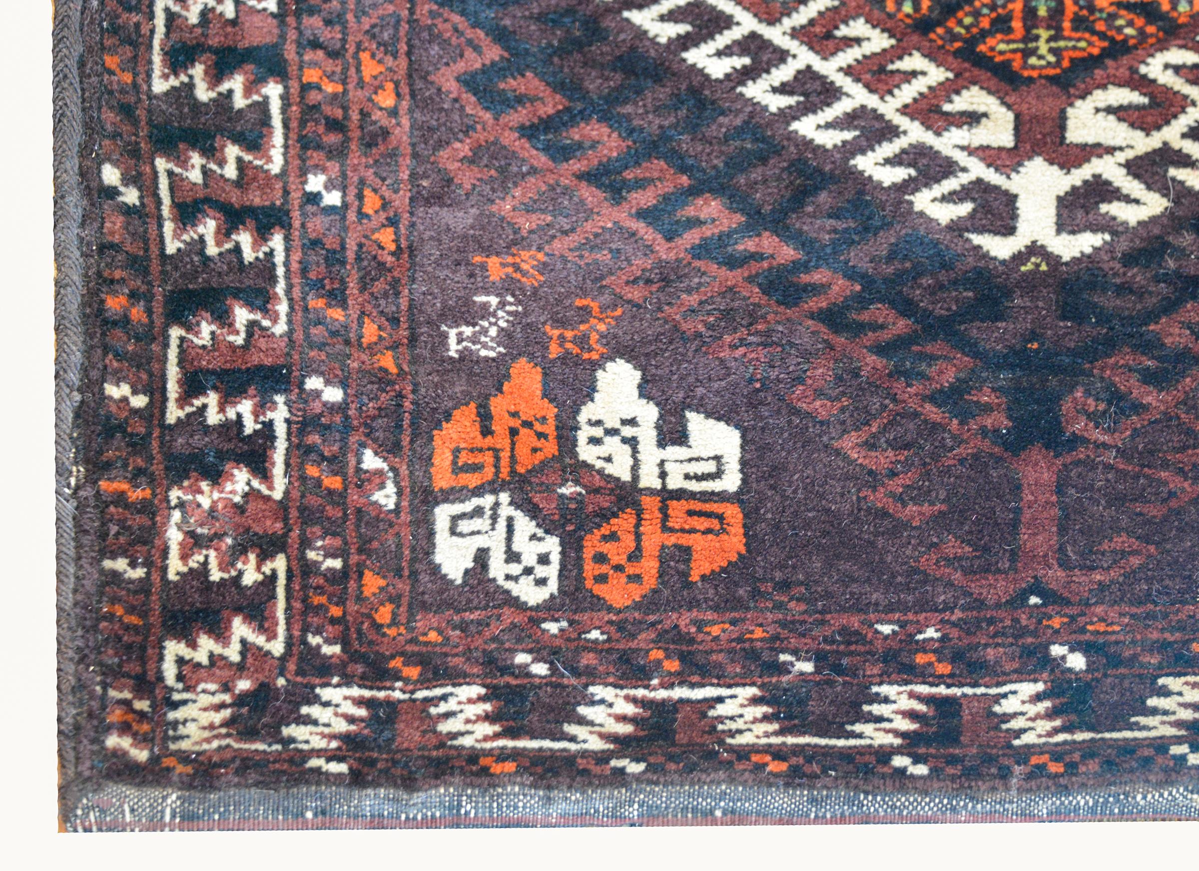 Tribal Early 20th Century Baluch Saddle Bag Rug For Sale
