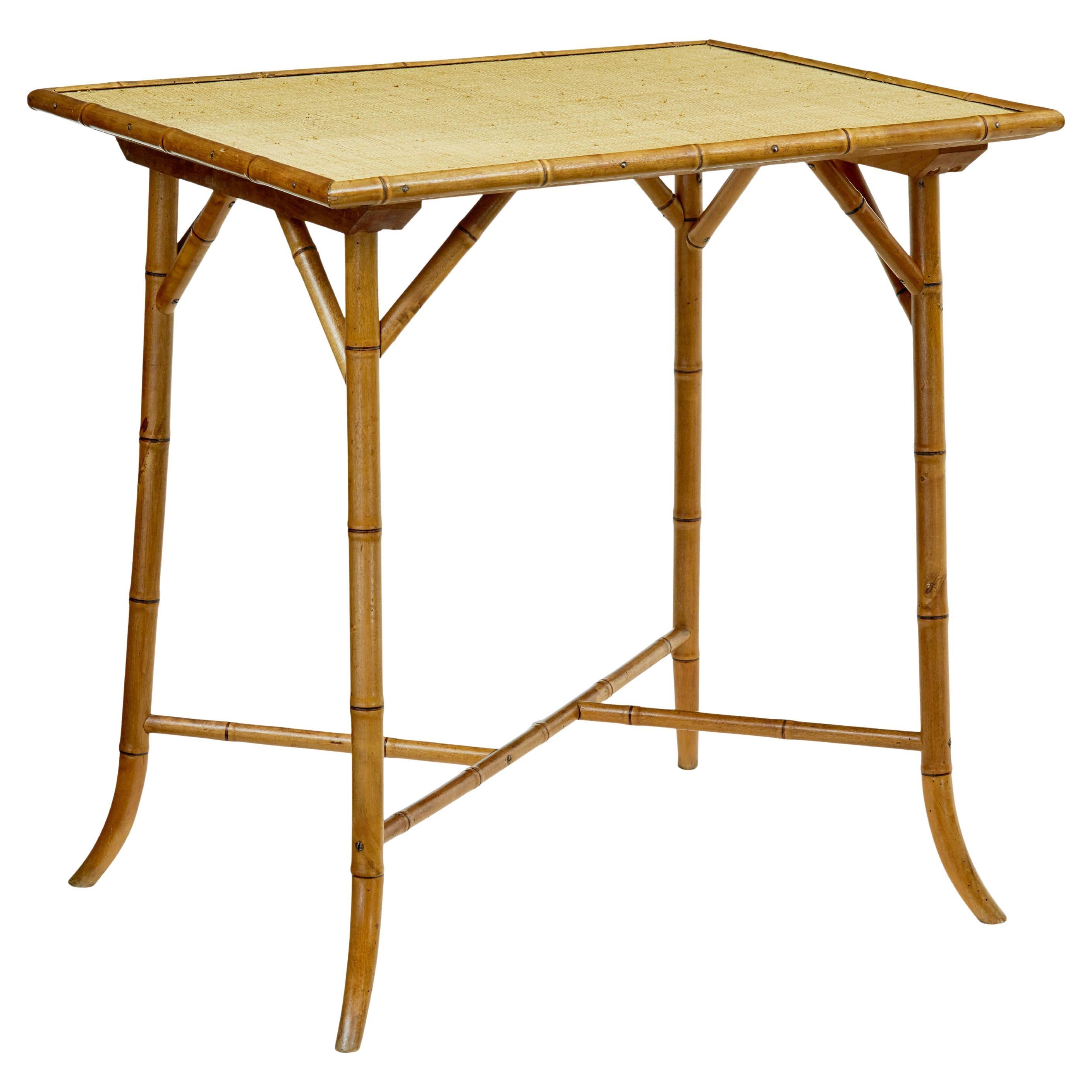 Early 20th century bamboo and hesian side table For Sale